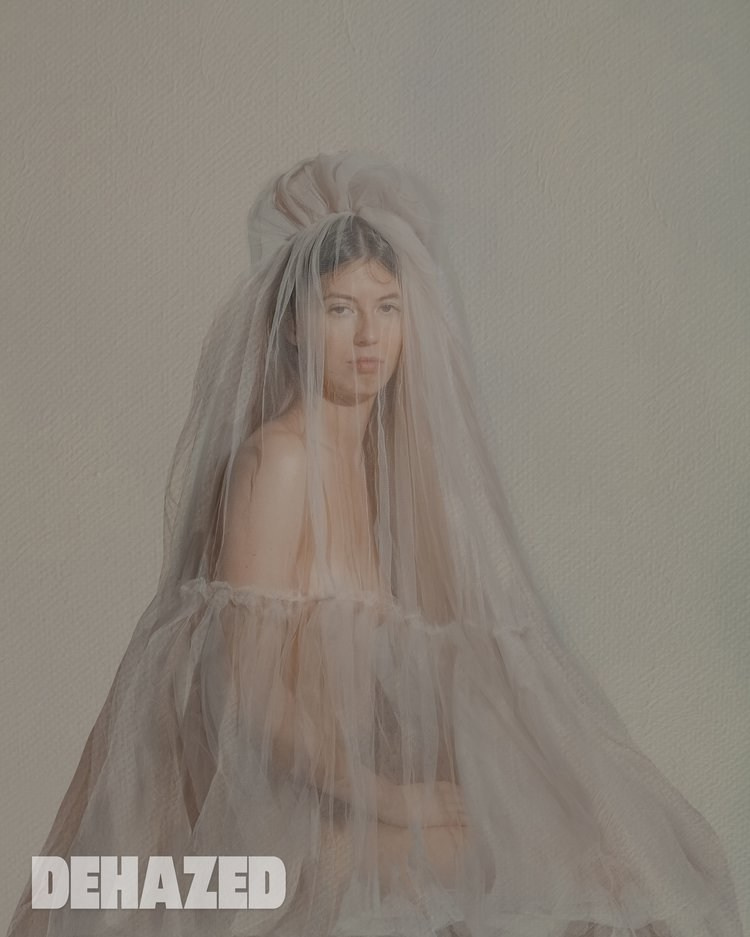 DEHAZED. MARINA MANUCHARIAN