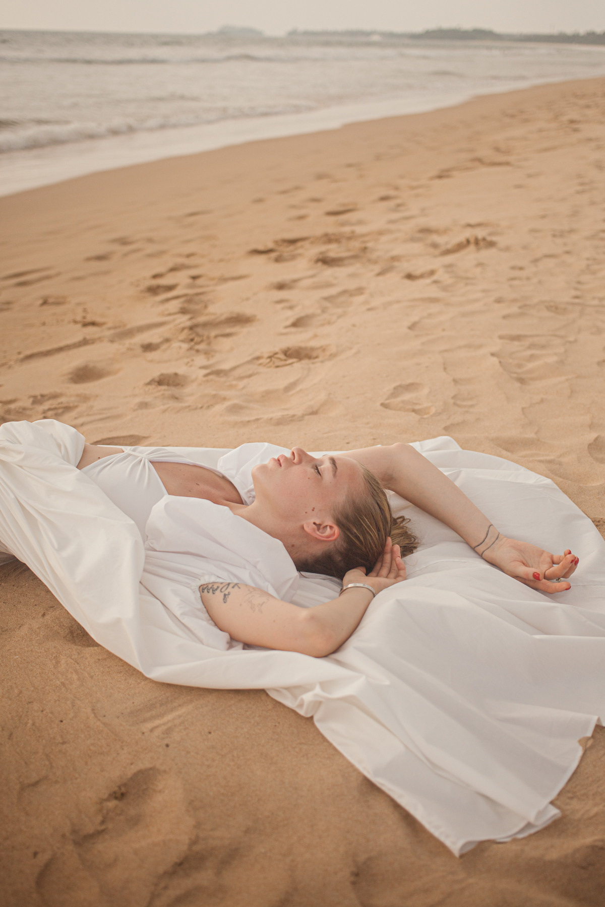 Maria, the designer of clothes. Darin the photographer