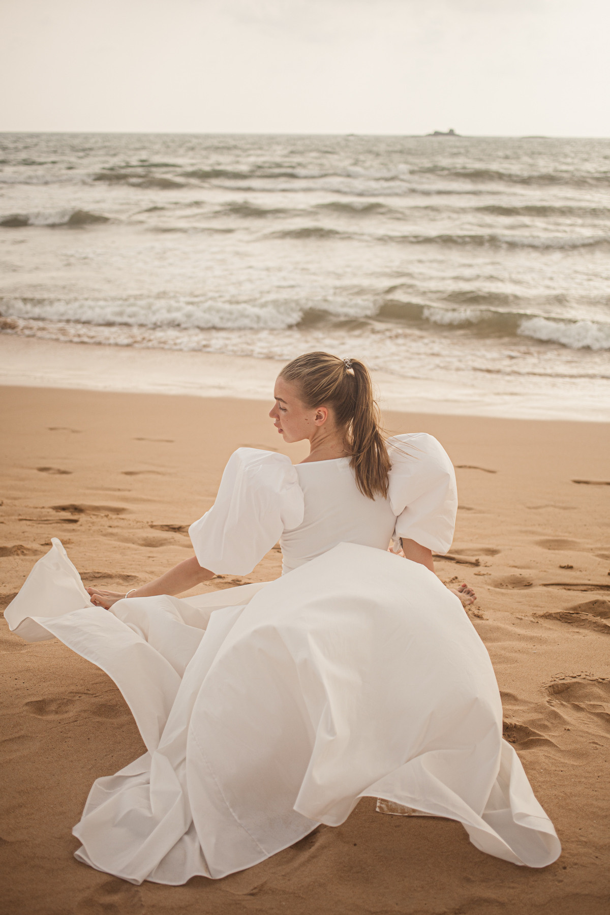 Maria, the designer of clothes. Darin the photographer