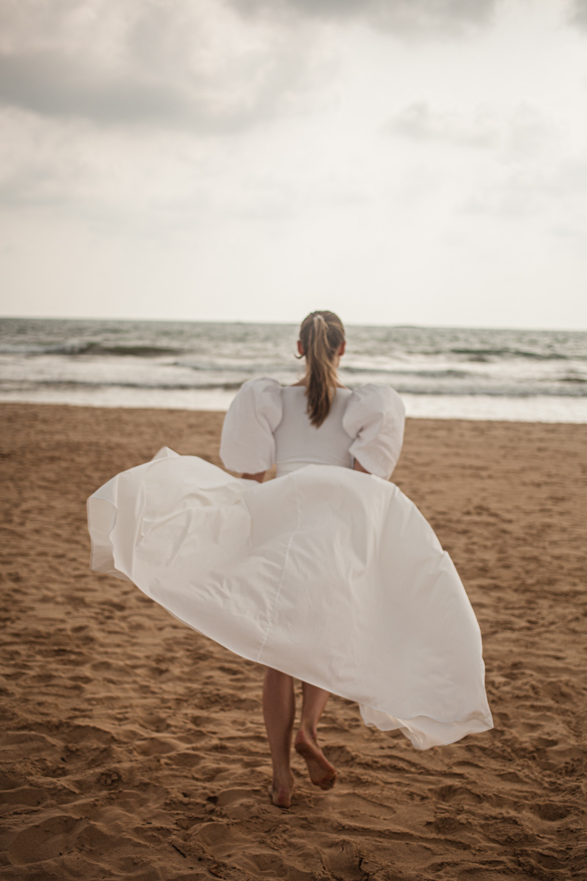 Maria, the designer of clothes. Darin the photographer