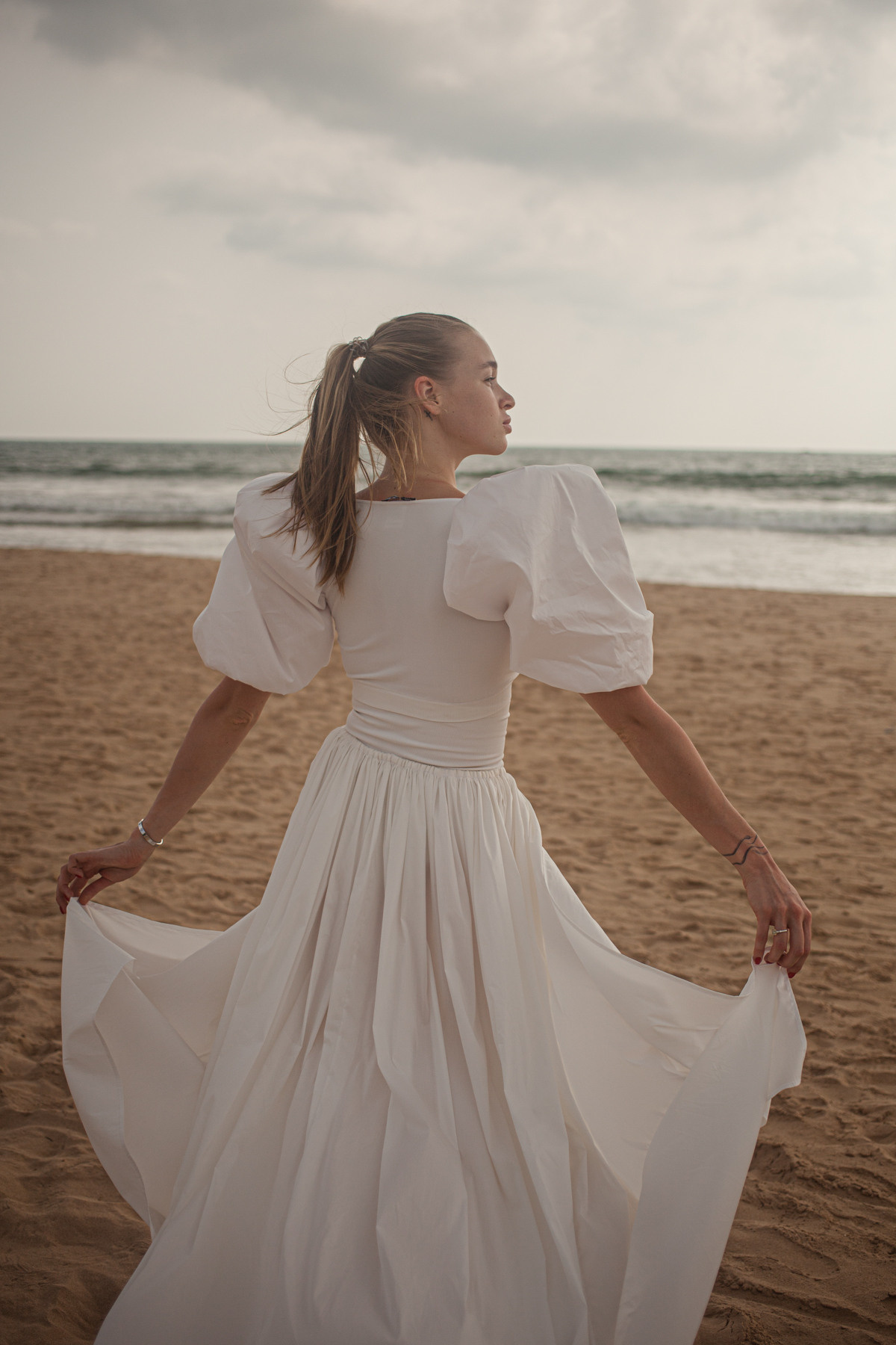 Maria, the designer of clothes. Darin the photographer