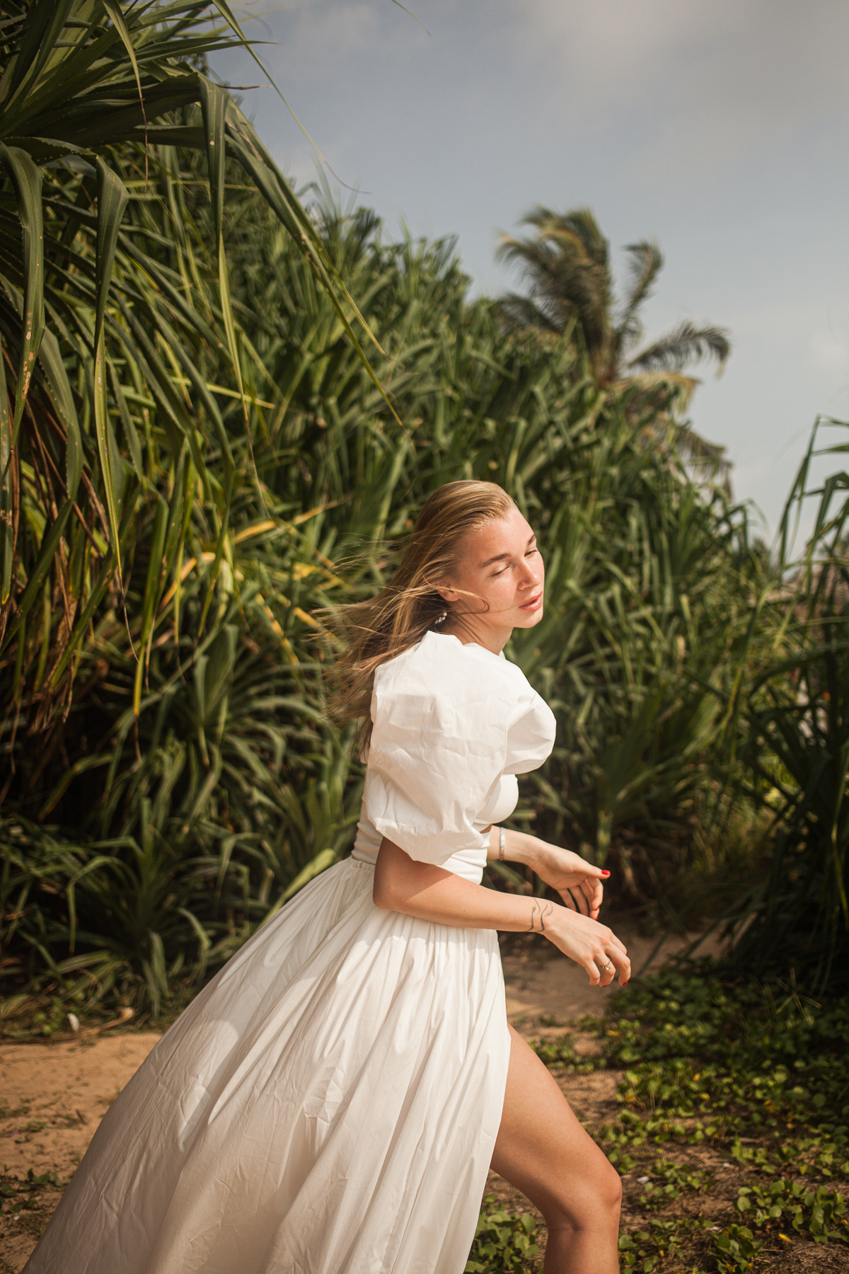 Maria, the designer of clothes. Darin the photographer