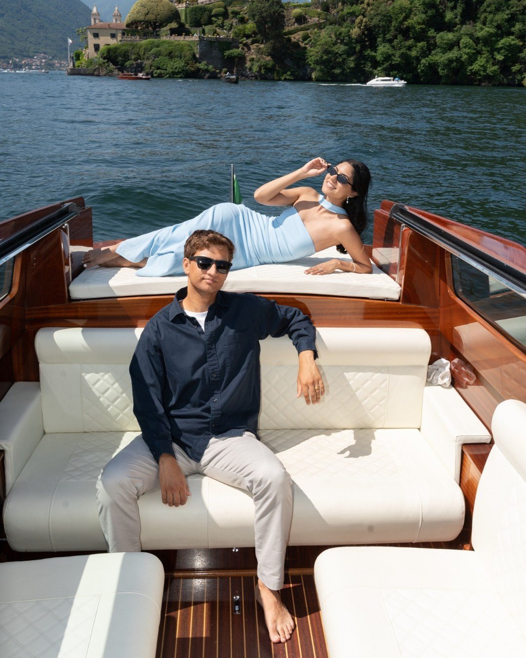 Lake Como boat photo, couple in front of Villa del Balbianello
