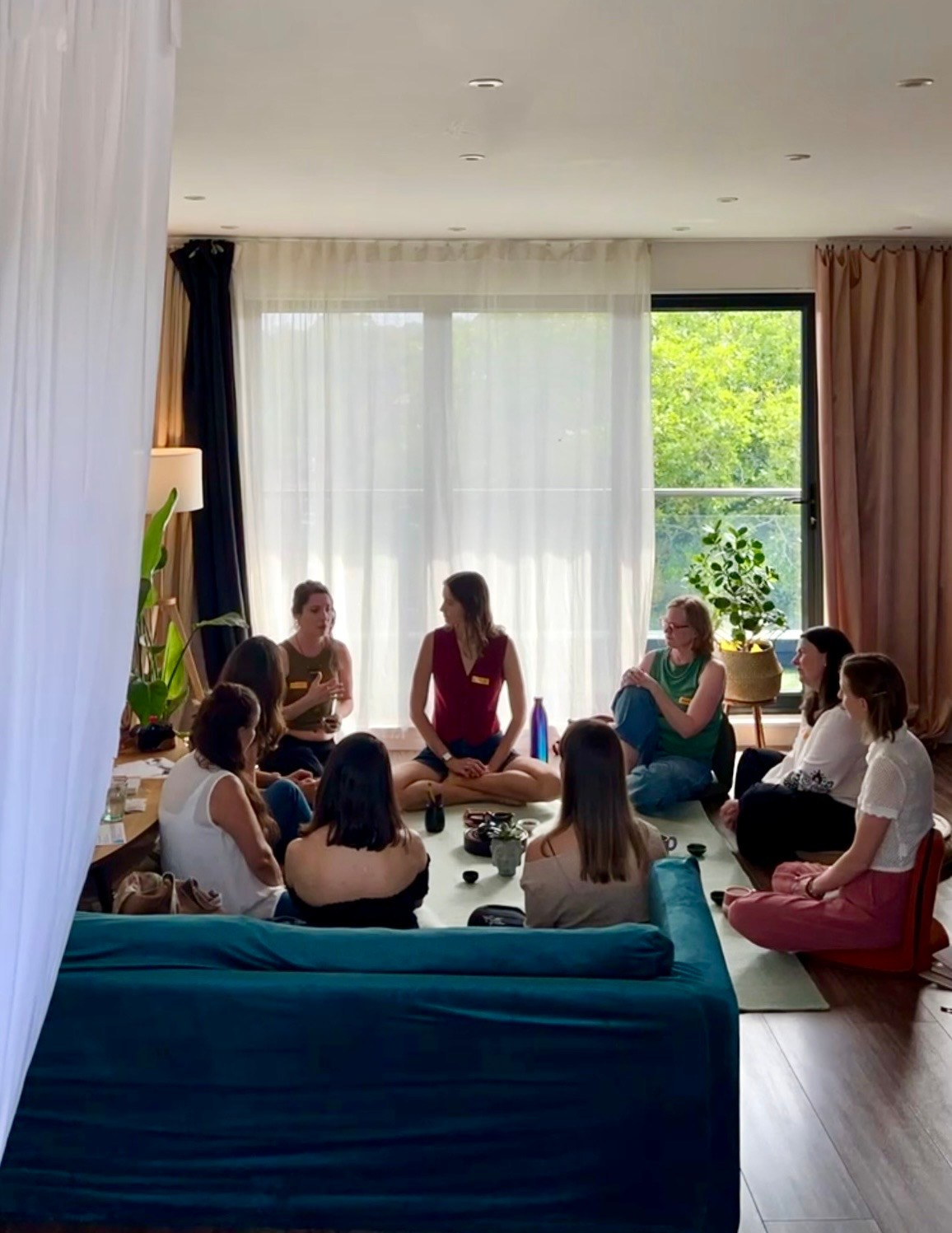 Women sharing conversation at Seen & Connected