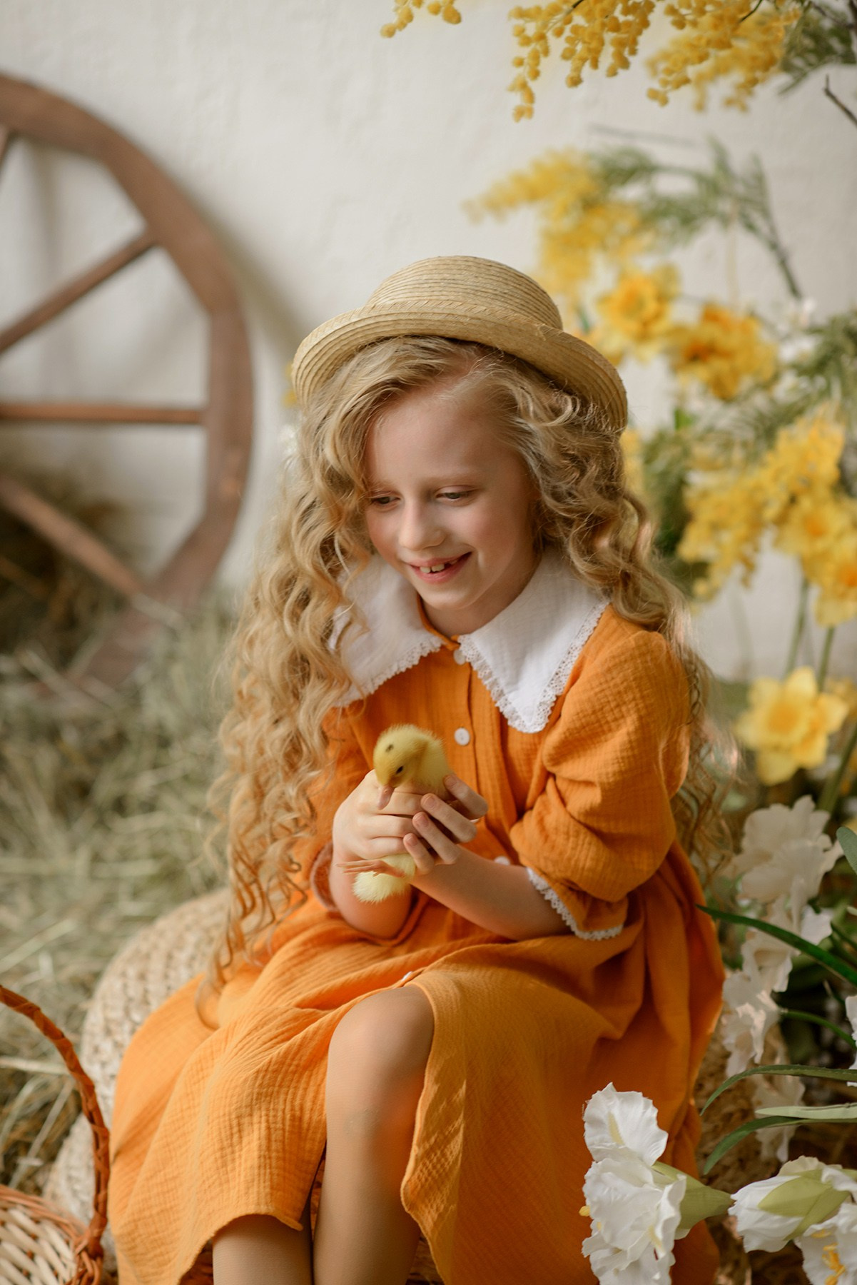 Photo shoot of a girl with goslings and a hat. Photographer Elena Carruthers, Scotland