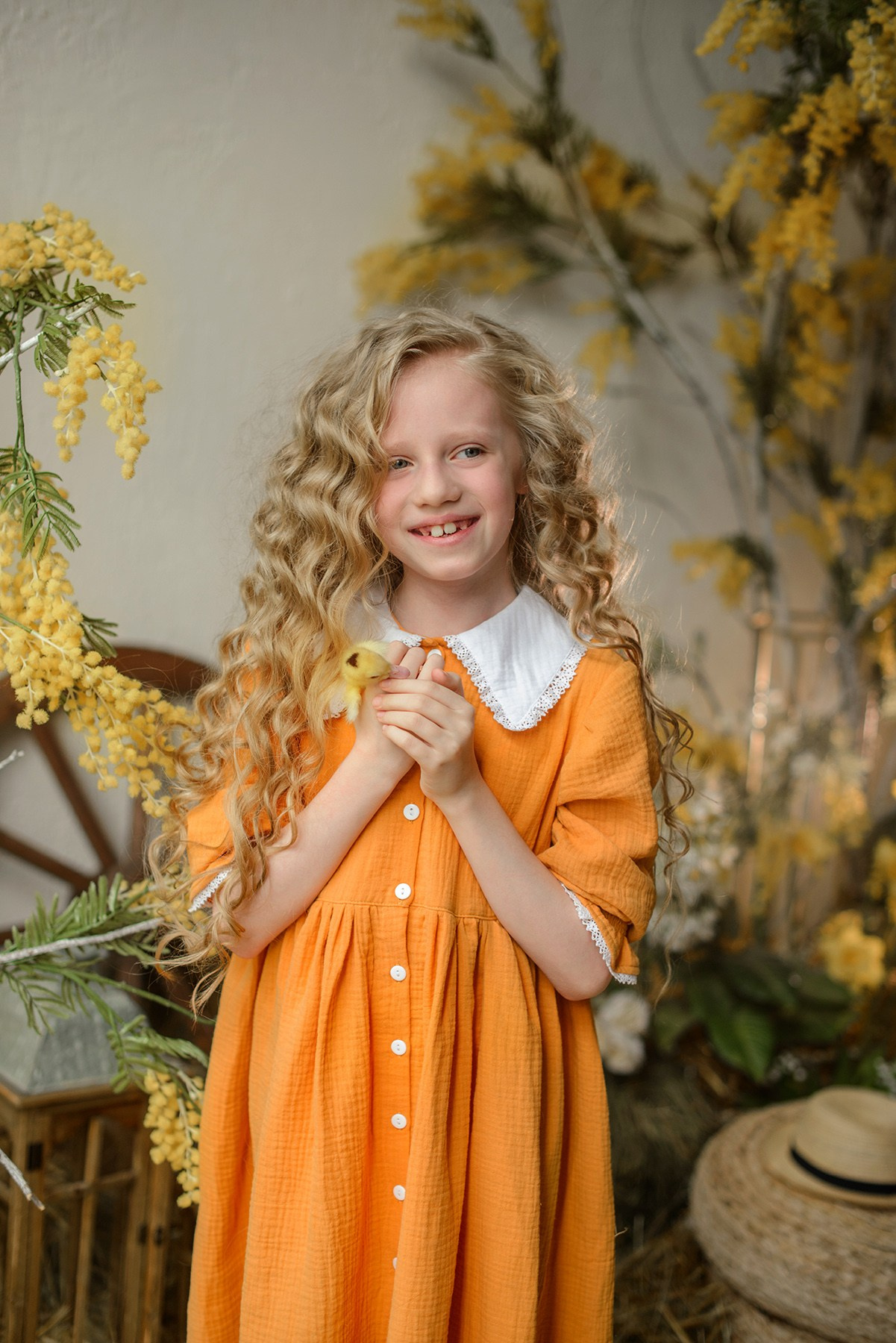 Photo shoot of a girl with goslings and a hat. Photographer Elena Carruthers, Scotland