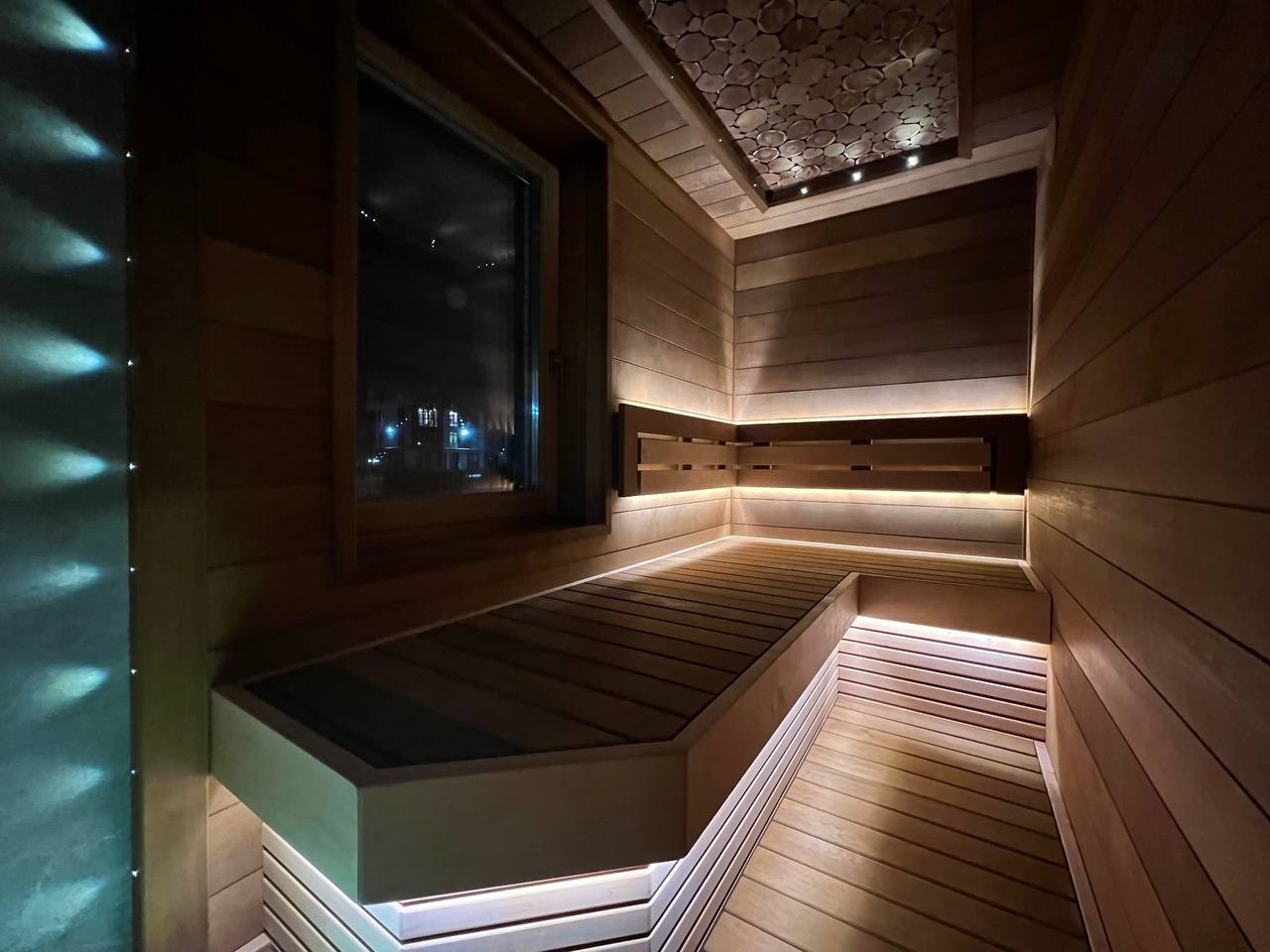 Сауна в Румболово из ольхи на базе электрокаменки IKI Monolith. С добавлением оптоволокна и светодиодных лент производителя Harvia. SaunaTopMasters