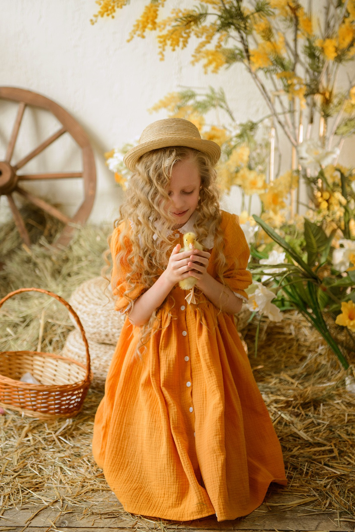 Photo shoot of a girl with goslings and a hat. Photographer Elena Carruthers, Scotland