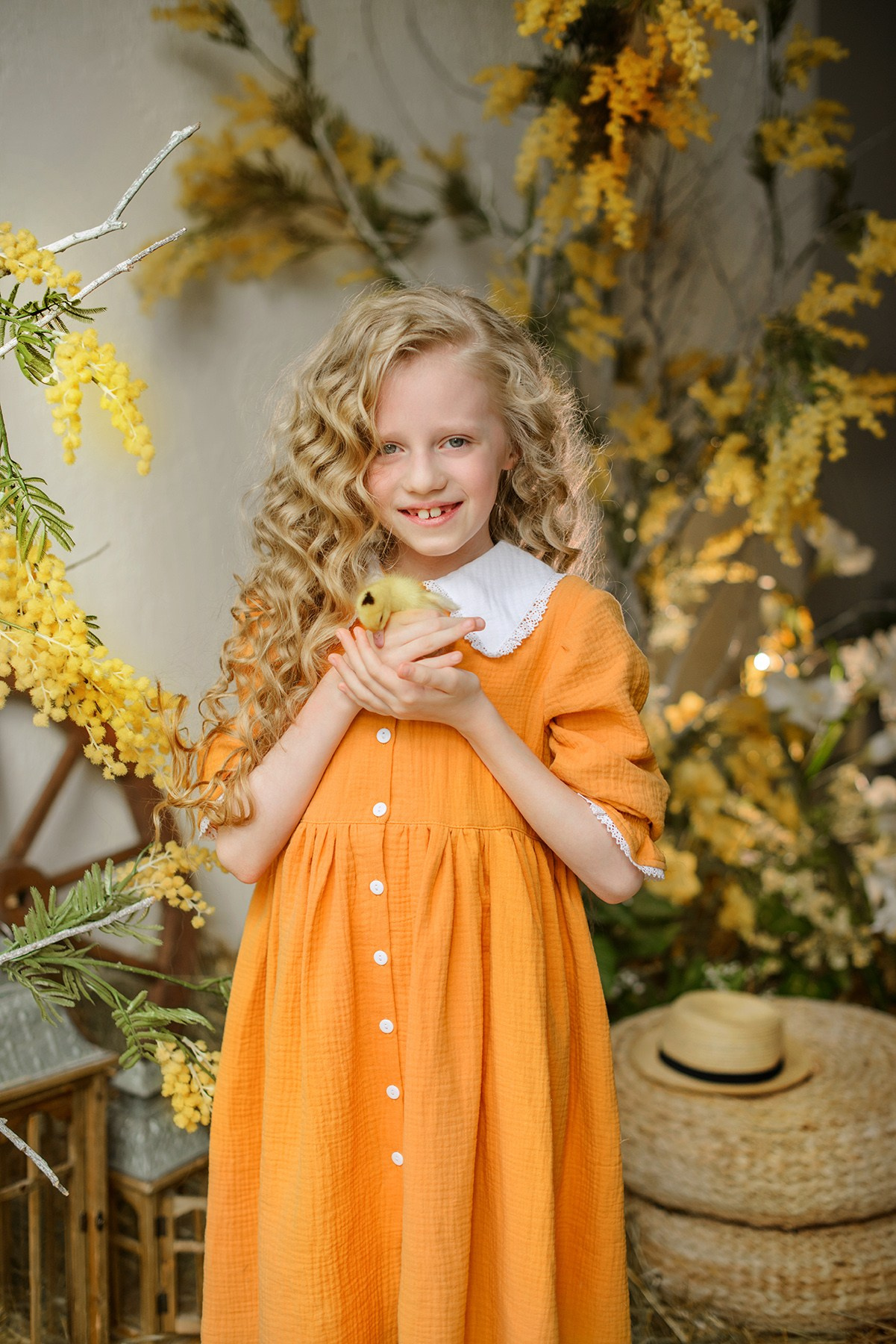 Photo shoot of a girl with goslings and a hat. Photographer Elena Carruthers, Scotland