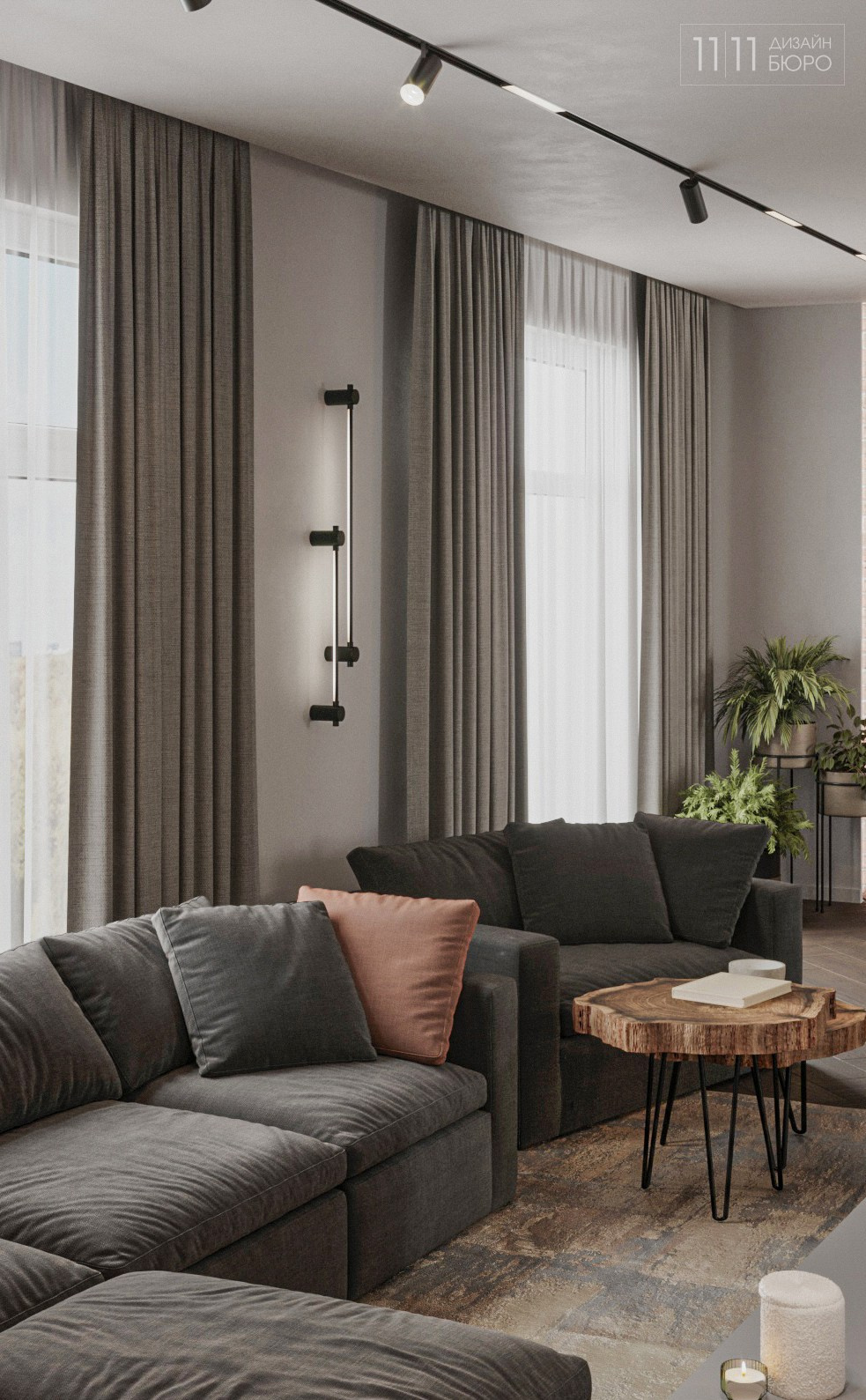 Минималистичный интерьер гостиной с серым диваном