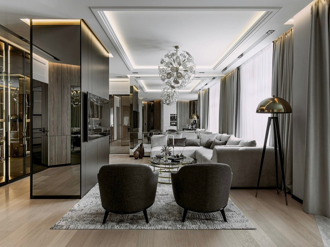 Просторная гостиная с угловым диваном и латунными акцентами — дизайн Валерии Котович