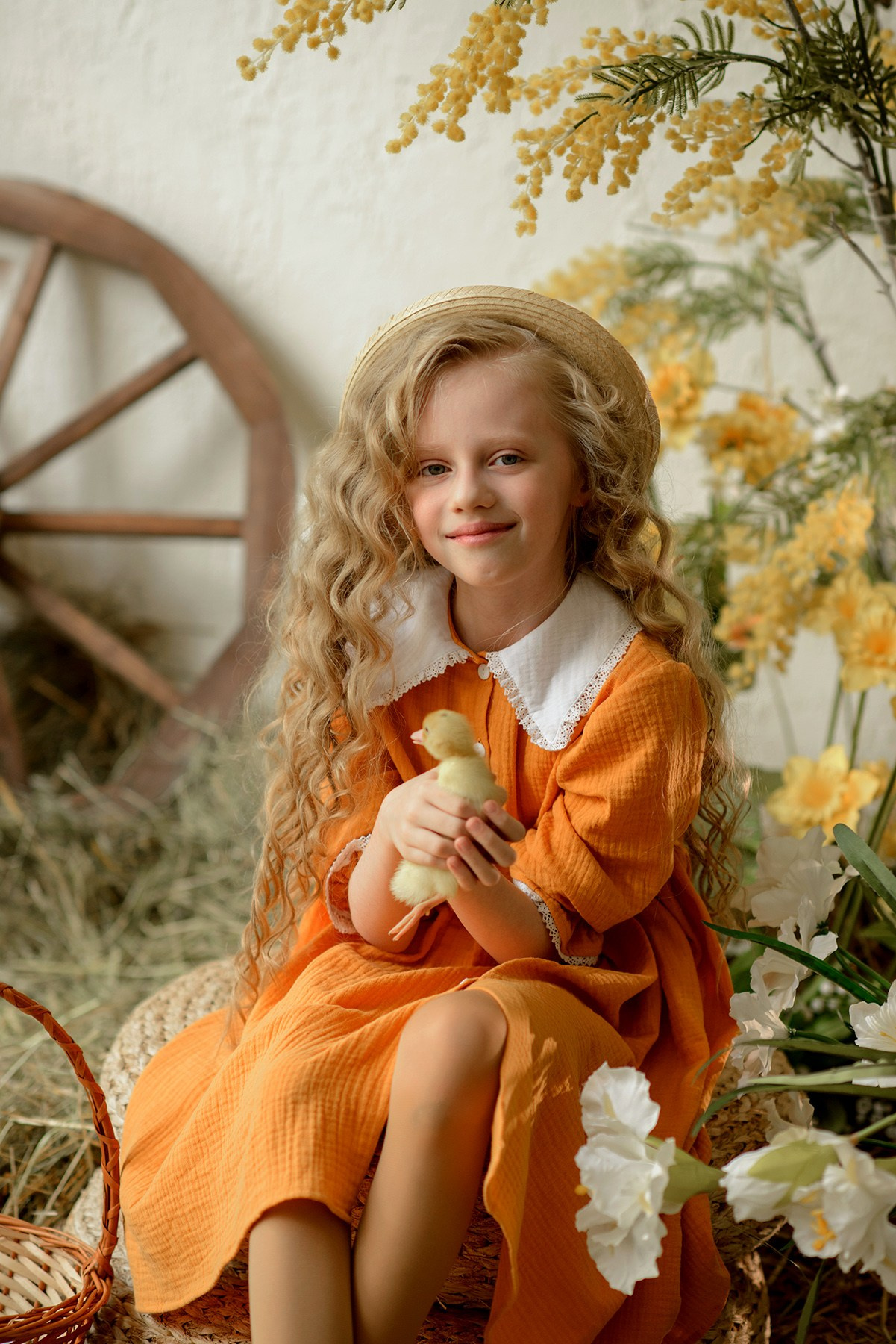 Photo shoot of a girl with goslings and a hat. Photographer Elena Carruthers, Scotland