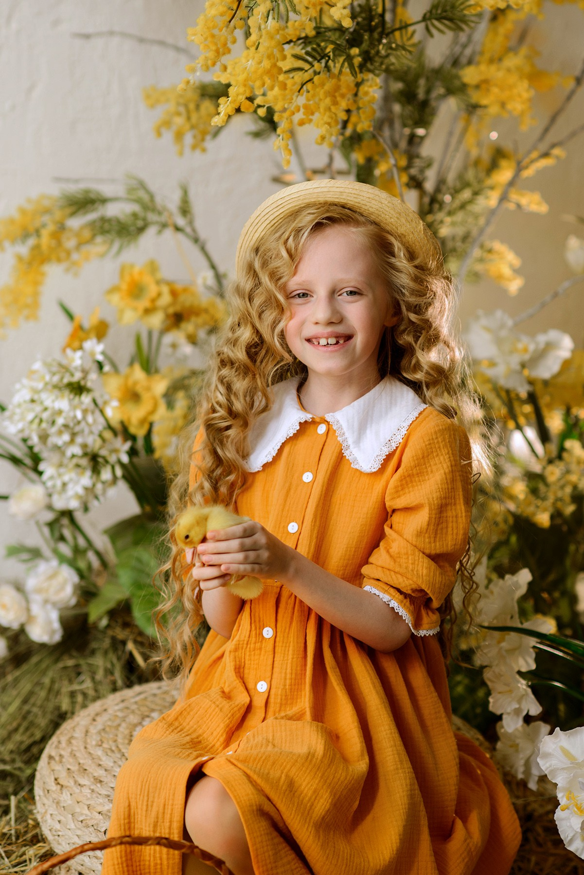 Photo shoot of a girl with goslings and a hat. Photographer Elena Carruthers, Scotland