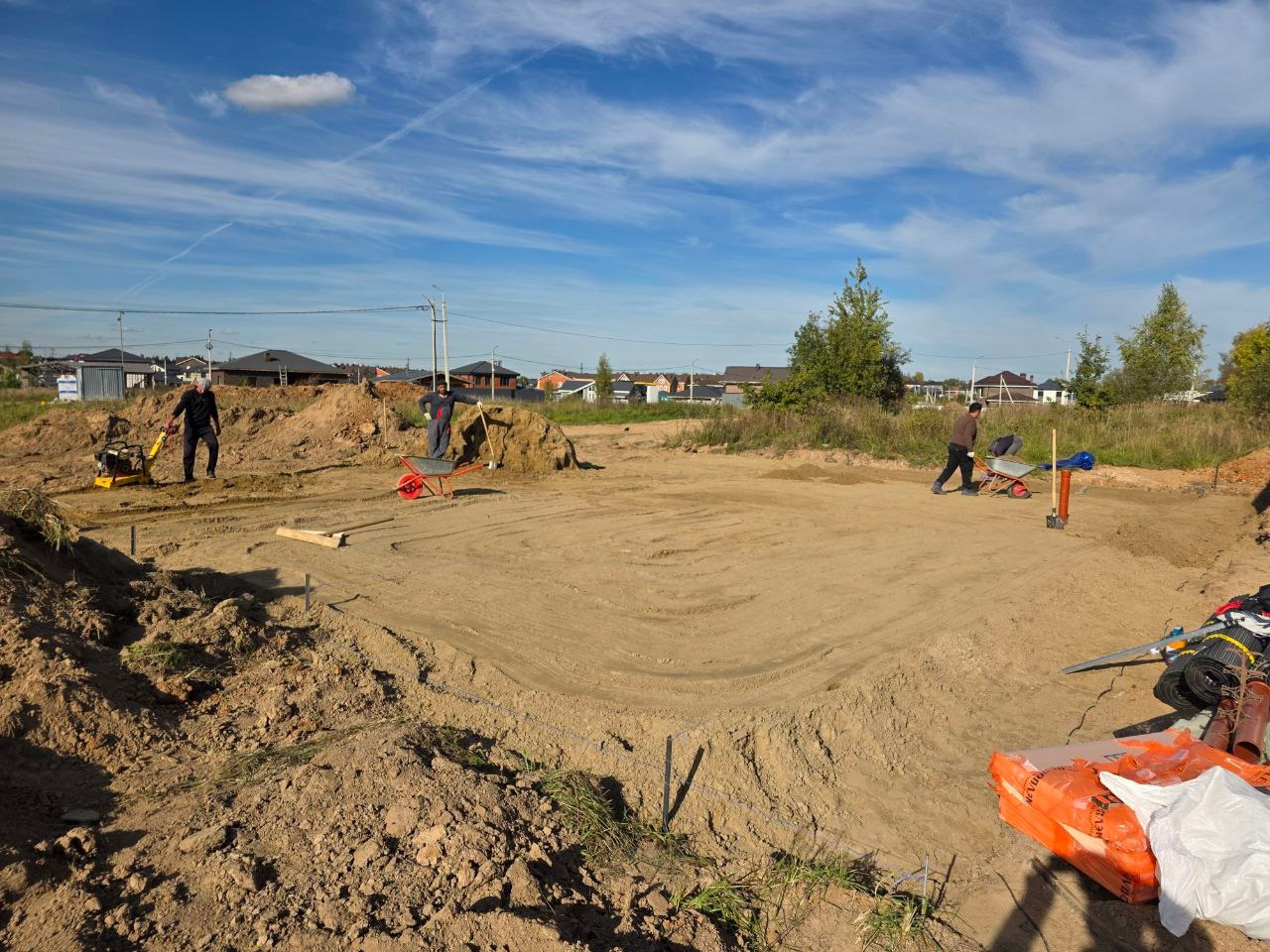 Послойная трамбовка песка 