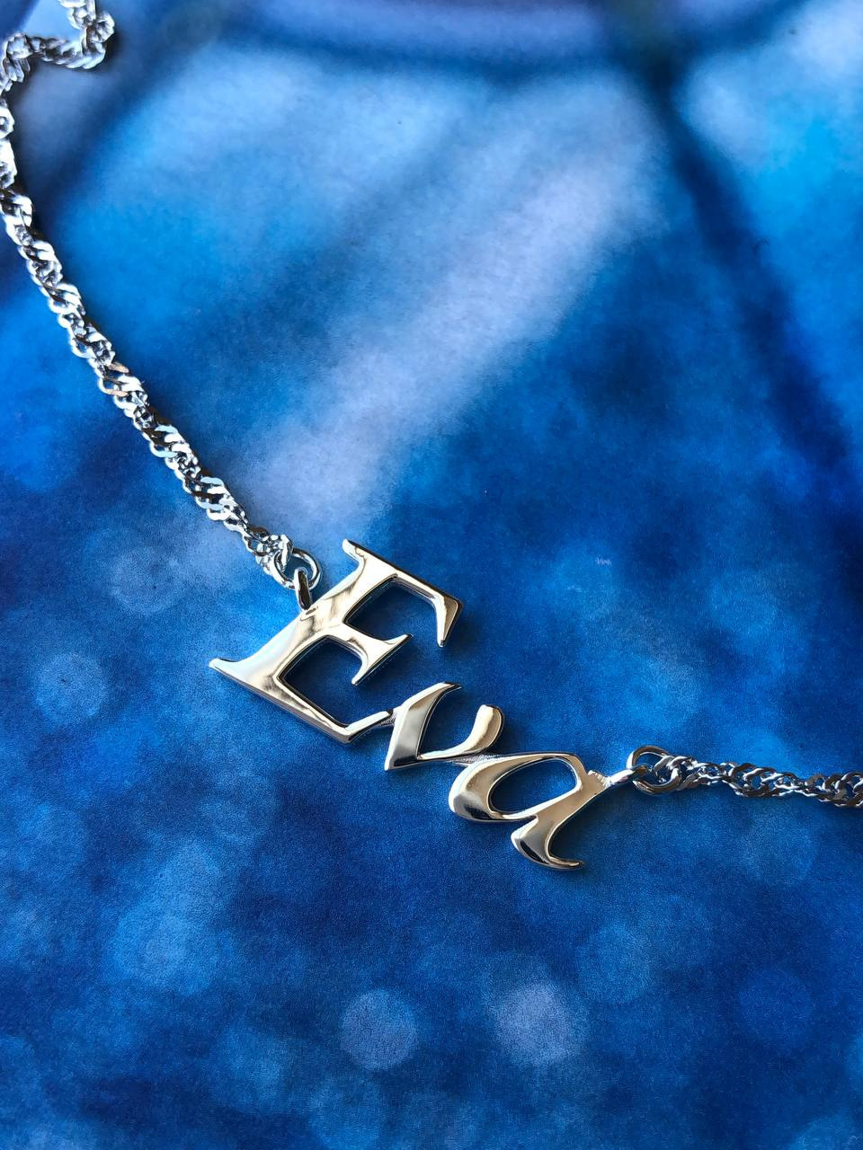 Именная подвеска "Eva" из серебра 925 пробы, родирование.