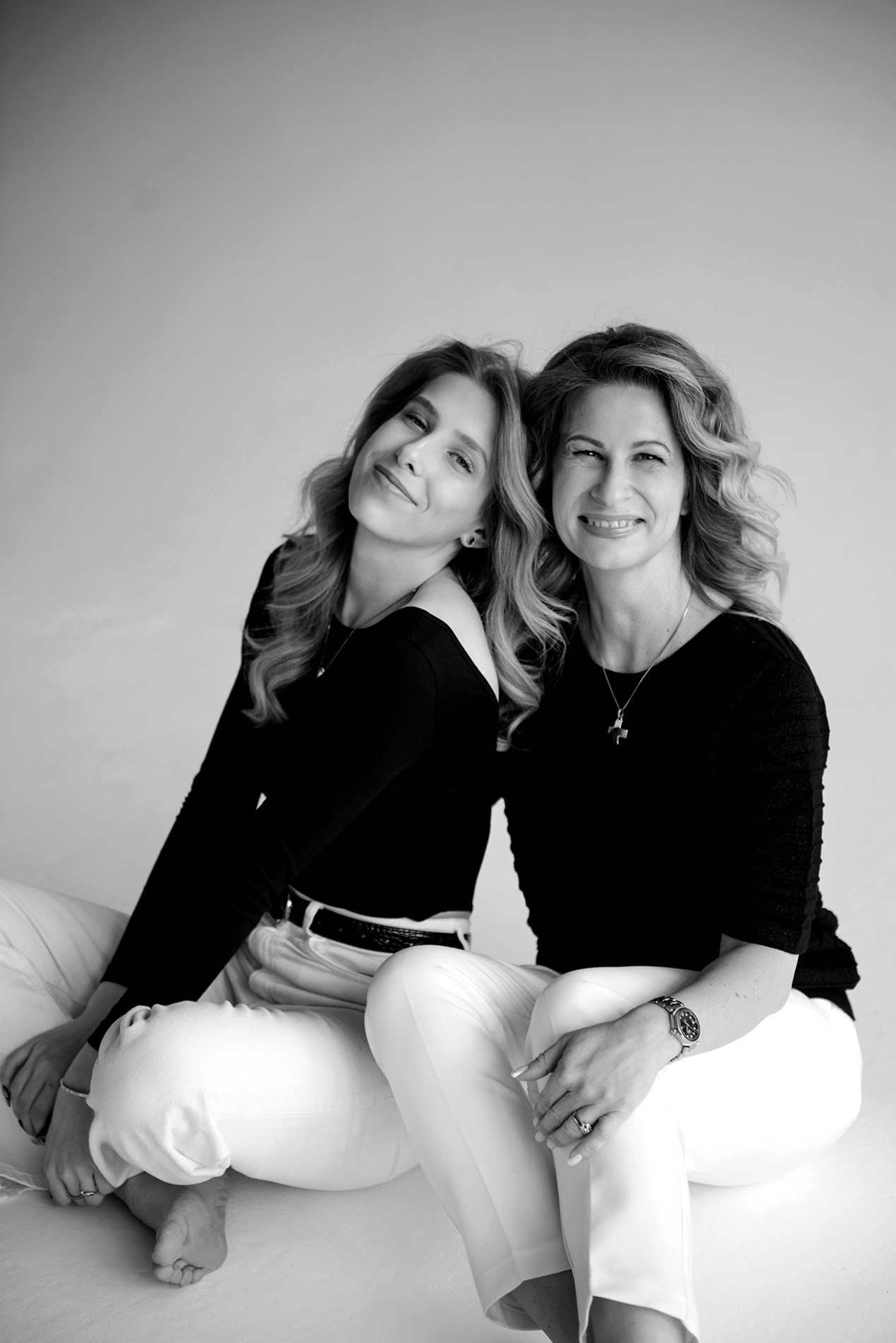 photo shoot for mom and daughter in the studio bw black and white