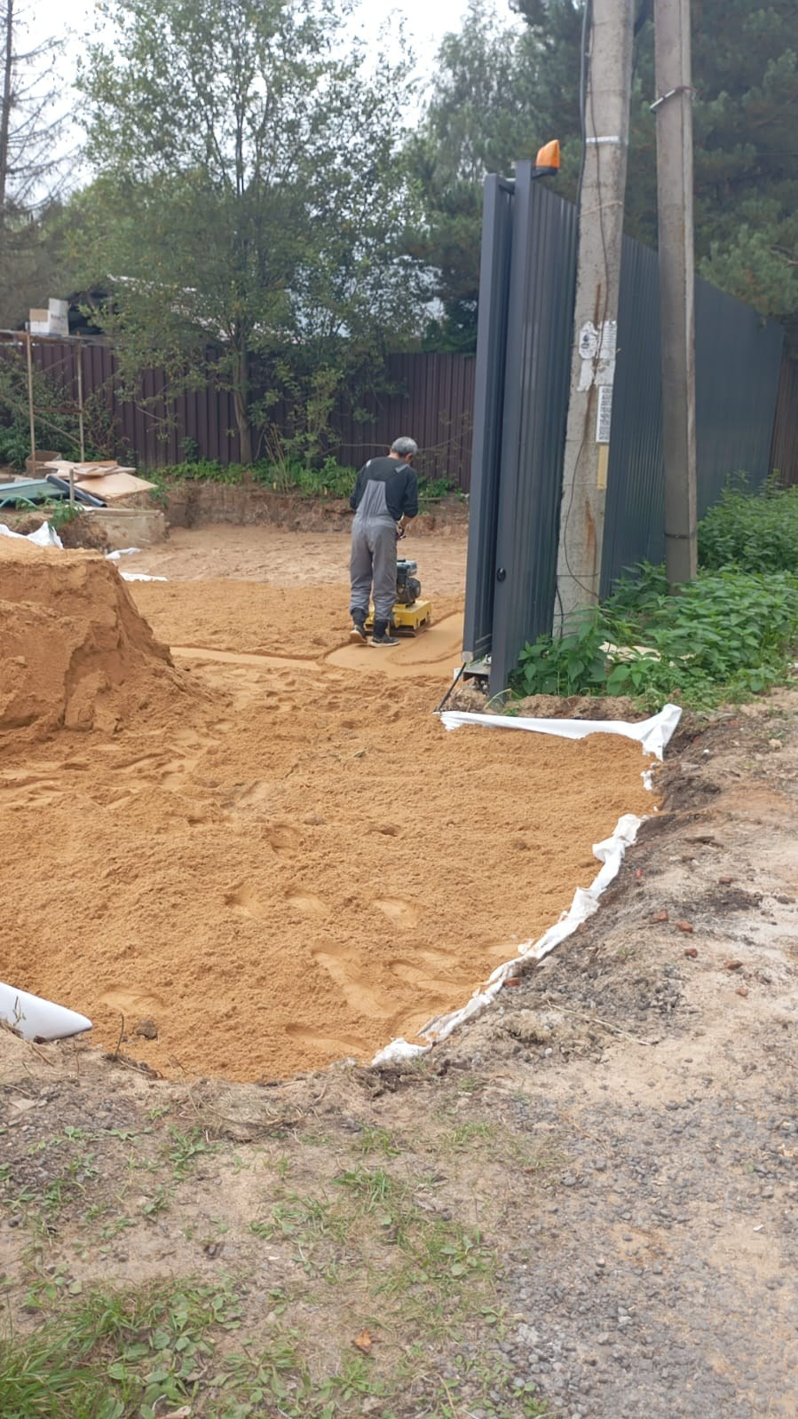 Послойная трамбовка песка