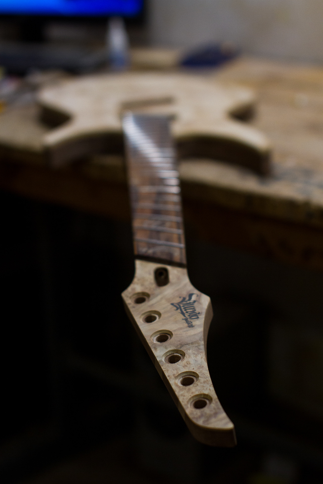 005. Master of making guitars and basses to order