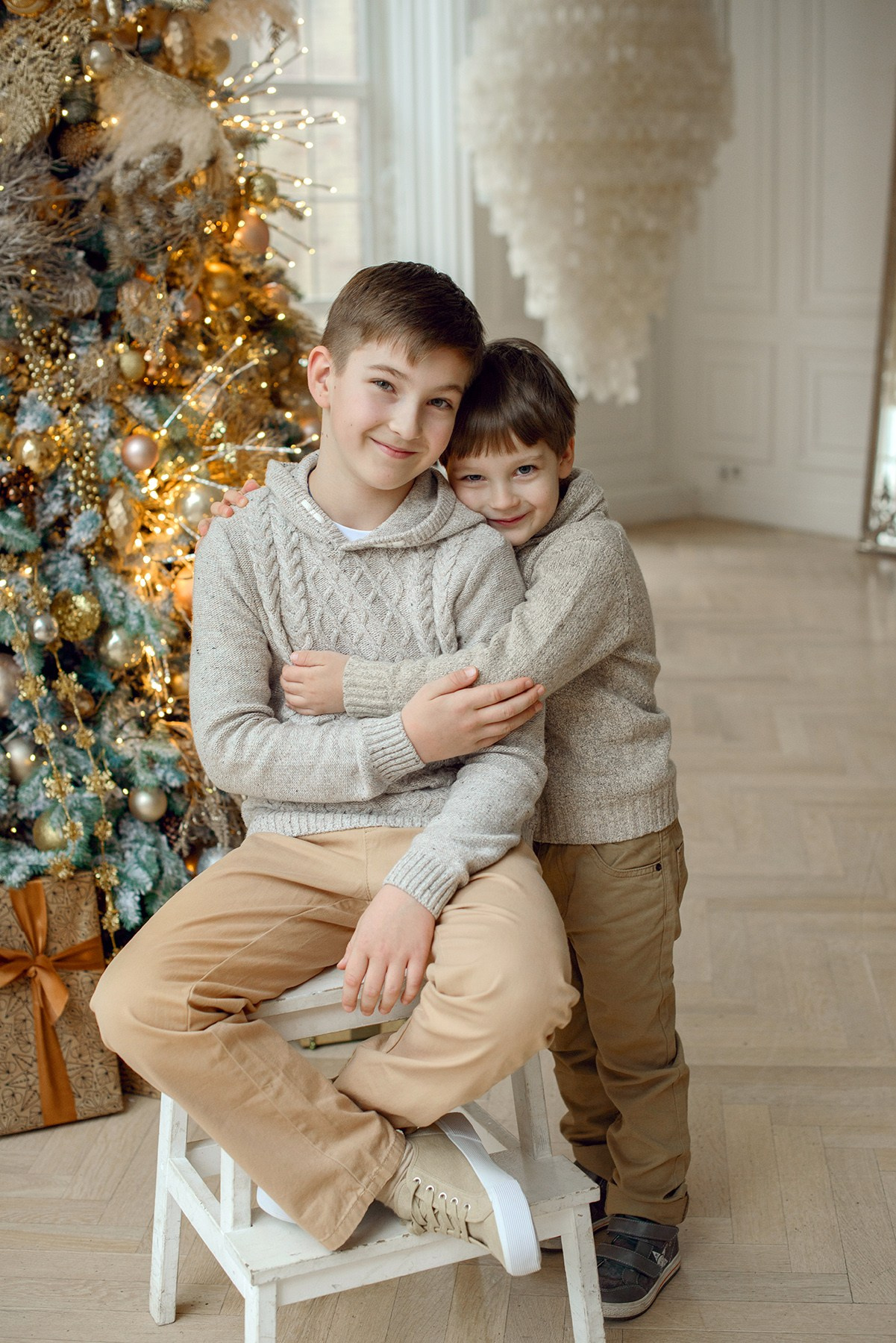Brothers, two boys , Studio photo shoot at Christmas time
