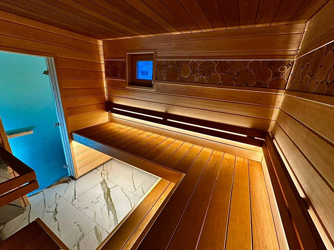 Сауна в Ольшаниках: просторный верхний полог для жаркого пара и уютный нижний — для юных ценителей бани. SaunaTopMasters
