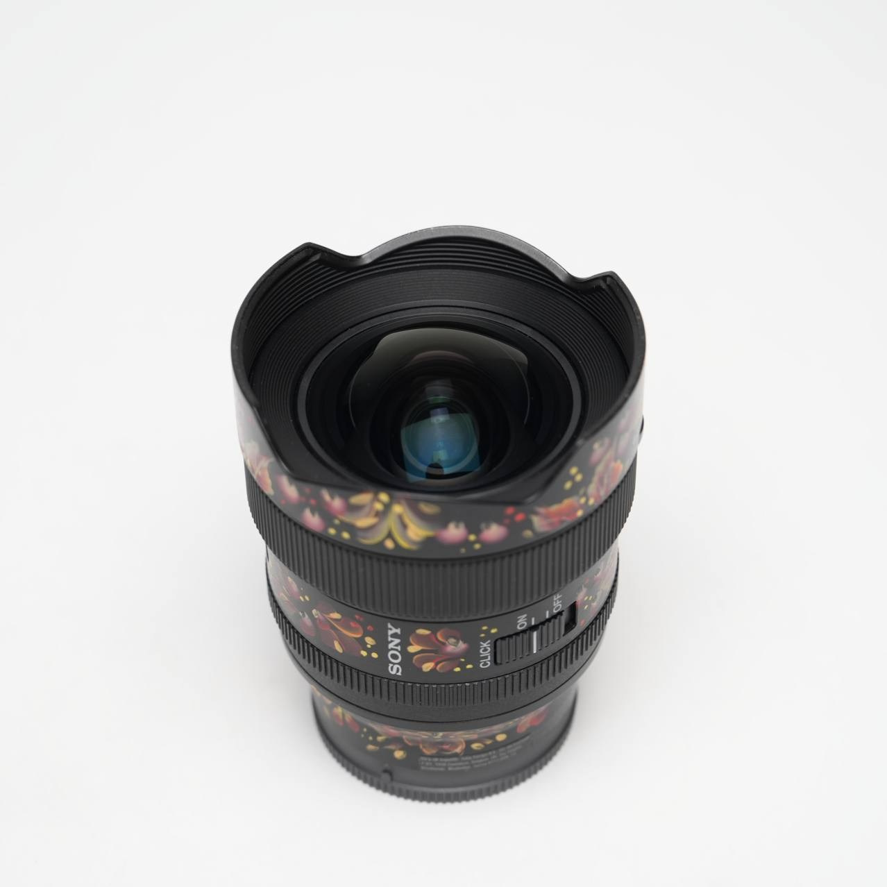 Sony 14 mm f 1,8 GM «Алый цветок». Фото и уникальный кастом объективов