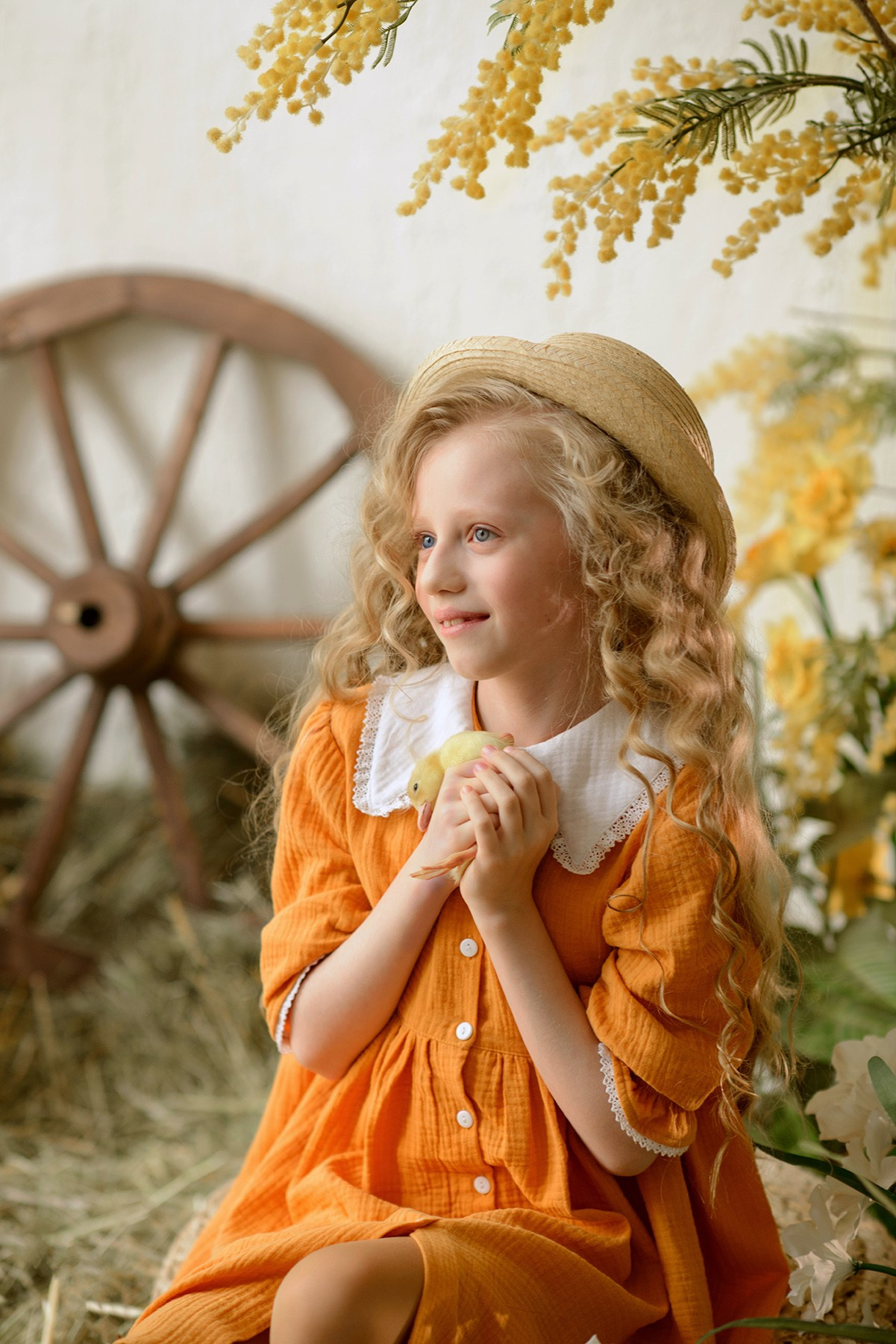 Photo shoot of a girl with goslings and a hat. Photographer Elena Carruthers, Scotland