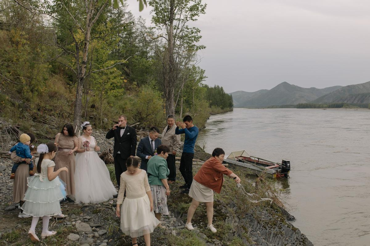 Wedding walk on the banks of the Tompo River.