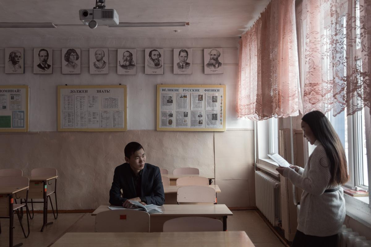 11th grade student Danil Kirillin at the school lesson. 