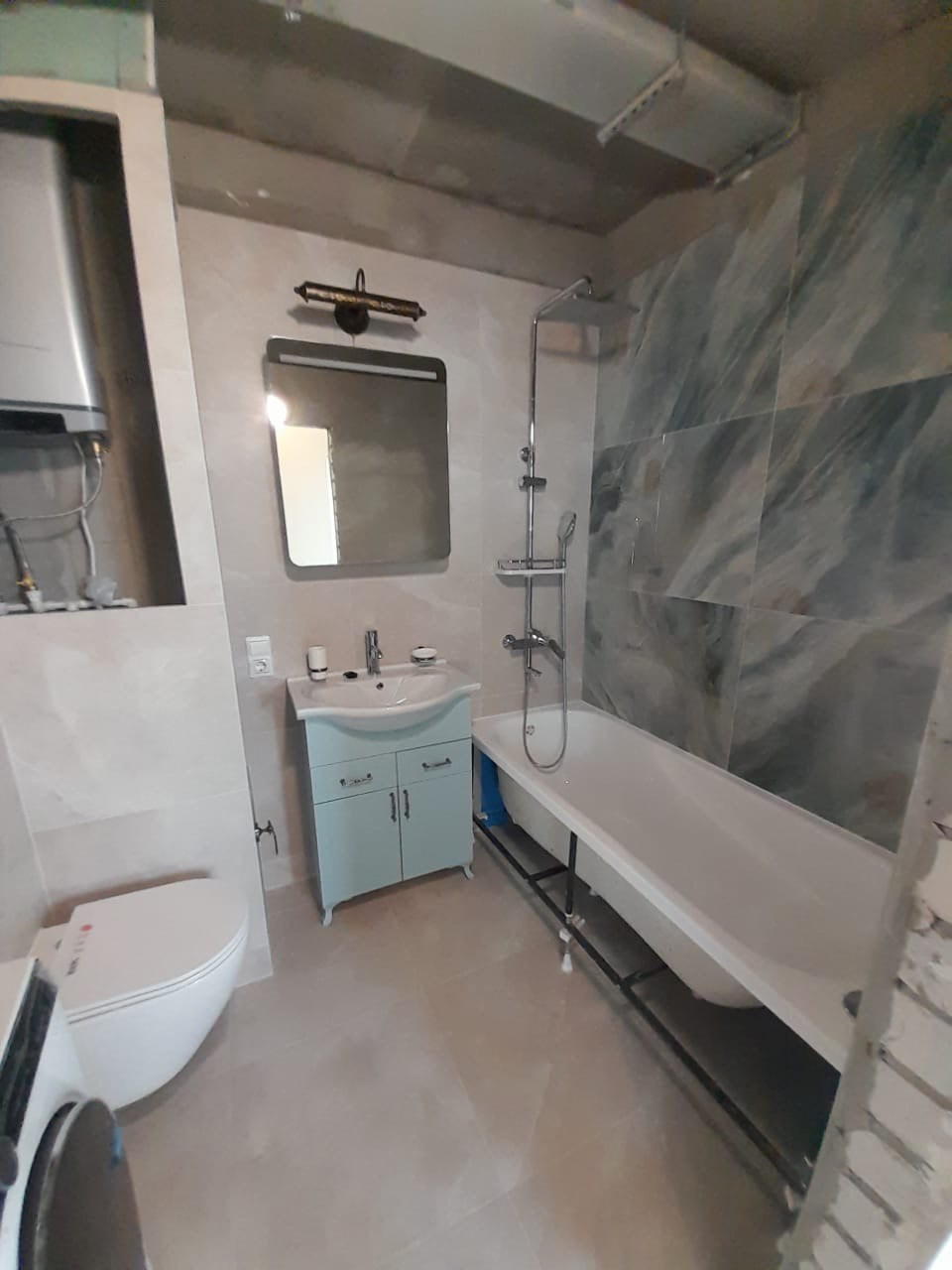 Ванная комната (ул. Михаила Миля д. 9). Ремонт санузла, туалета, ванной под ключ в Казани. Укладка плитки