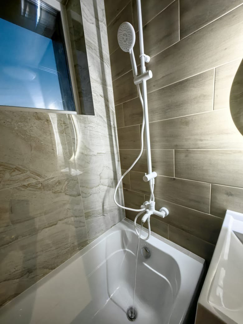 Ванная комната (с. Осиново ул. Спортивная д. 8). Ремонт санузла, туалета, ванной под ключ в Казани. Укладка плитки