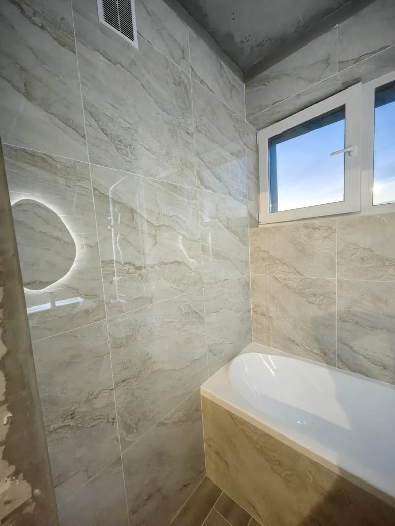 Ванная комната (с. Осиново ул. Спортивная д. 8). Ремонт санузла, туалета, ванной под ключ в Казани. Укладка плитки