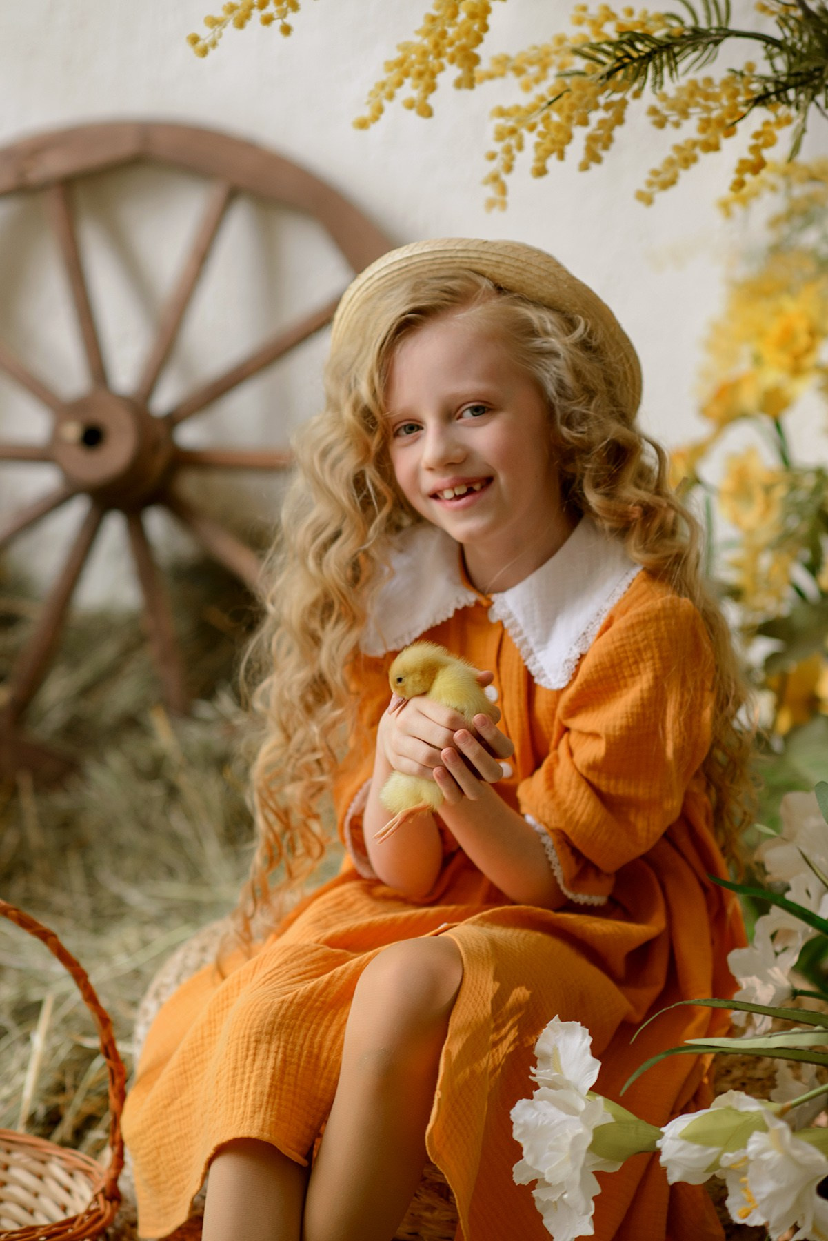 Photo shoot of a girl with goslings and a hat. Photographer Elena Carruthers, Scotland