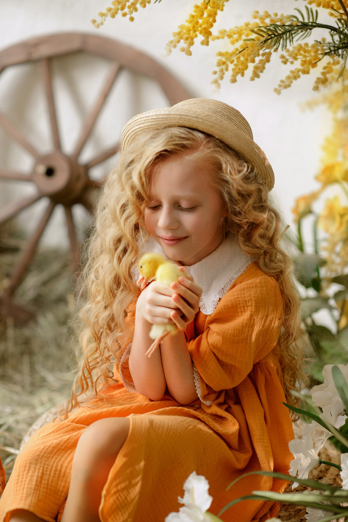 Photo shoot of a girl with goslings and a hat. Photographer Elena Carruthers, Scotland