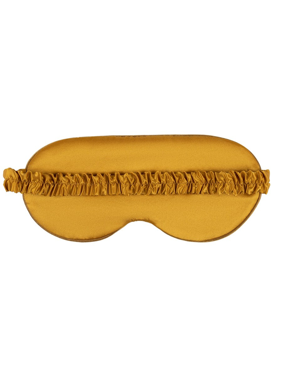 Маска для сна желтая на белом фоне