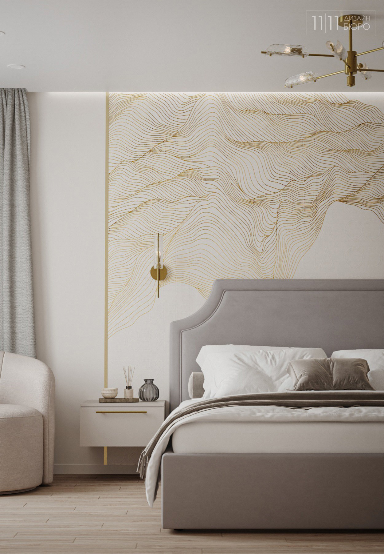 Мягкая серая кровать, обои-панно с золотыми линиями, бра и латунный молдинг