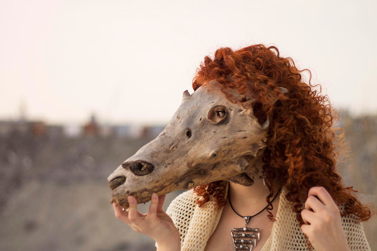 The tree mask like a scalp on woman's face