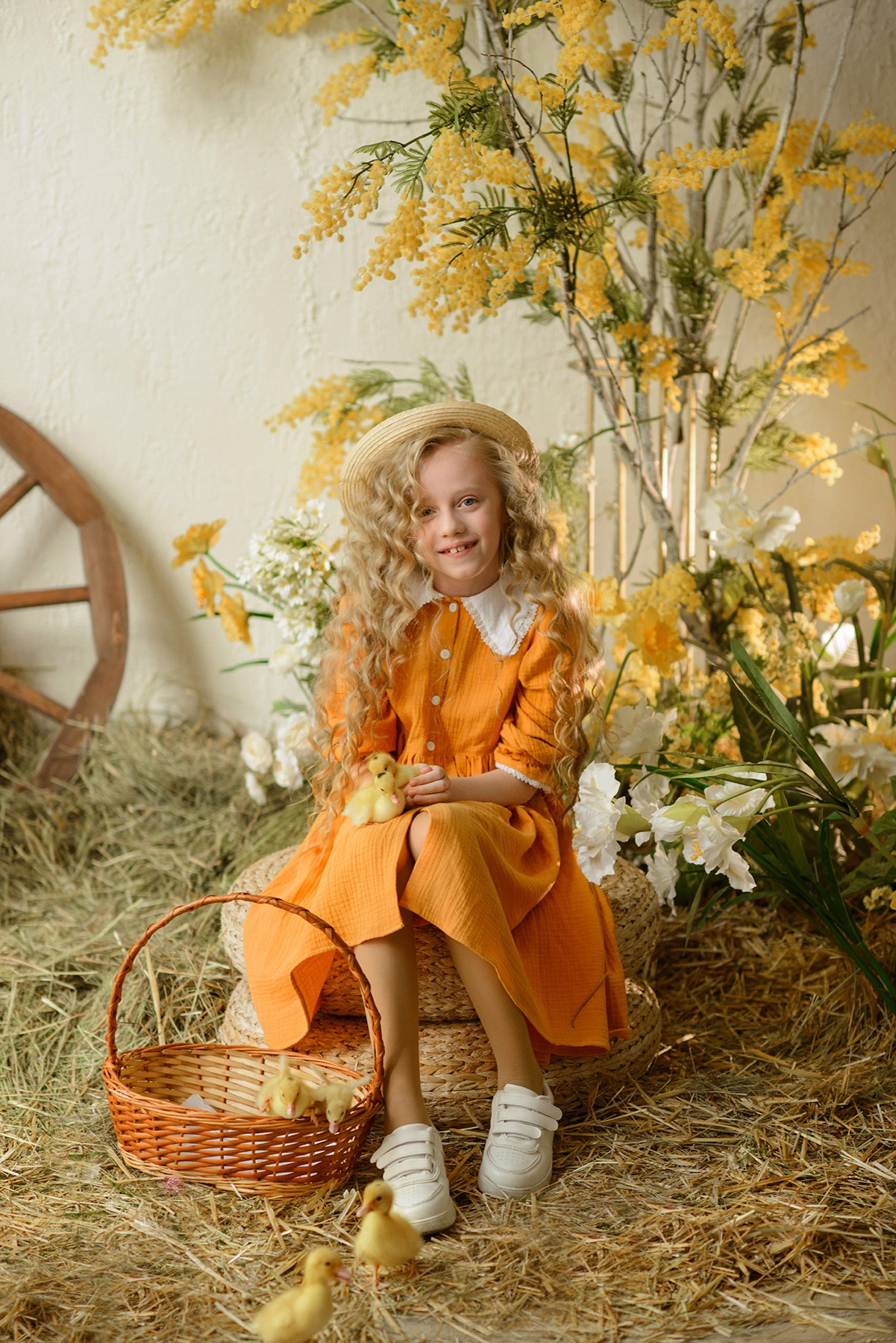 Photo shoot of a girl with goslings and a hat. Photographer Elena Carruthers, Scotland