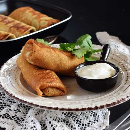 Блинчики с капустой и яйцом, заказать в Валенсии. Доставка.