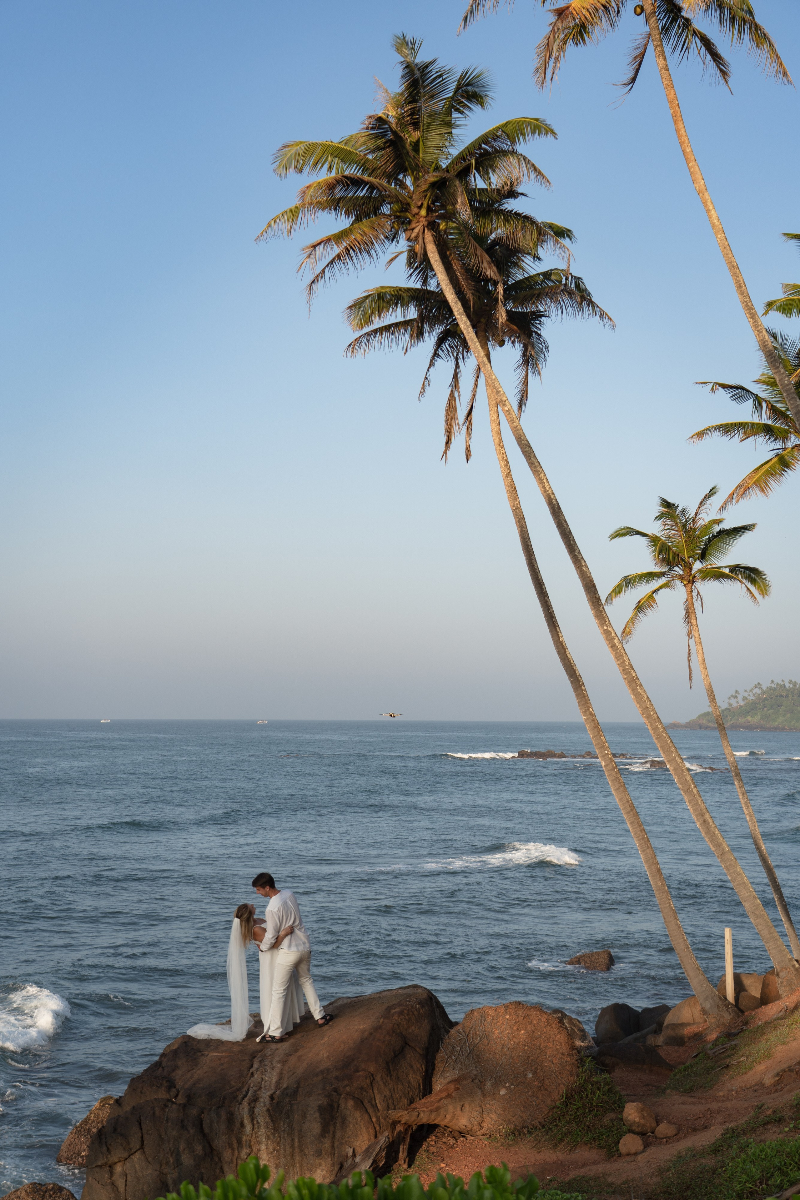 newlyweds by the ocean