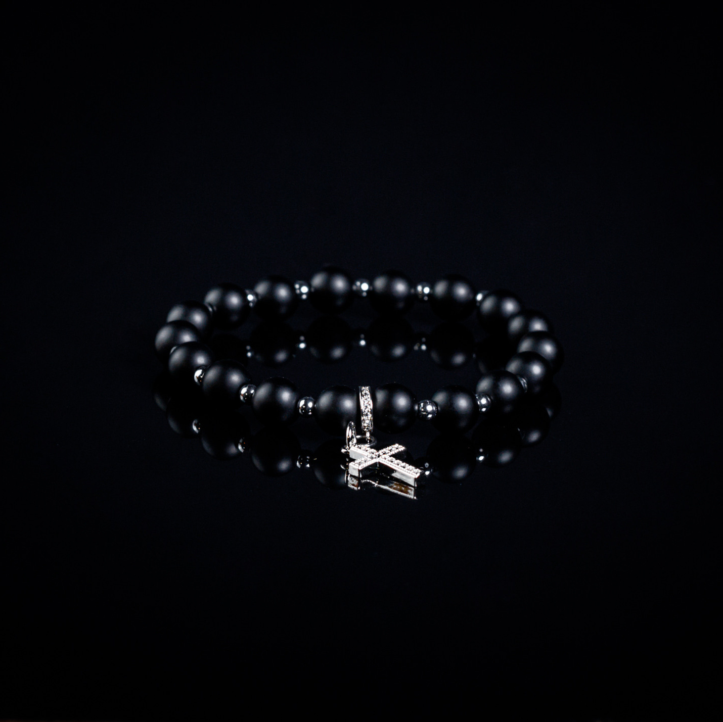 — из камней