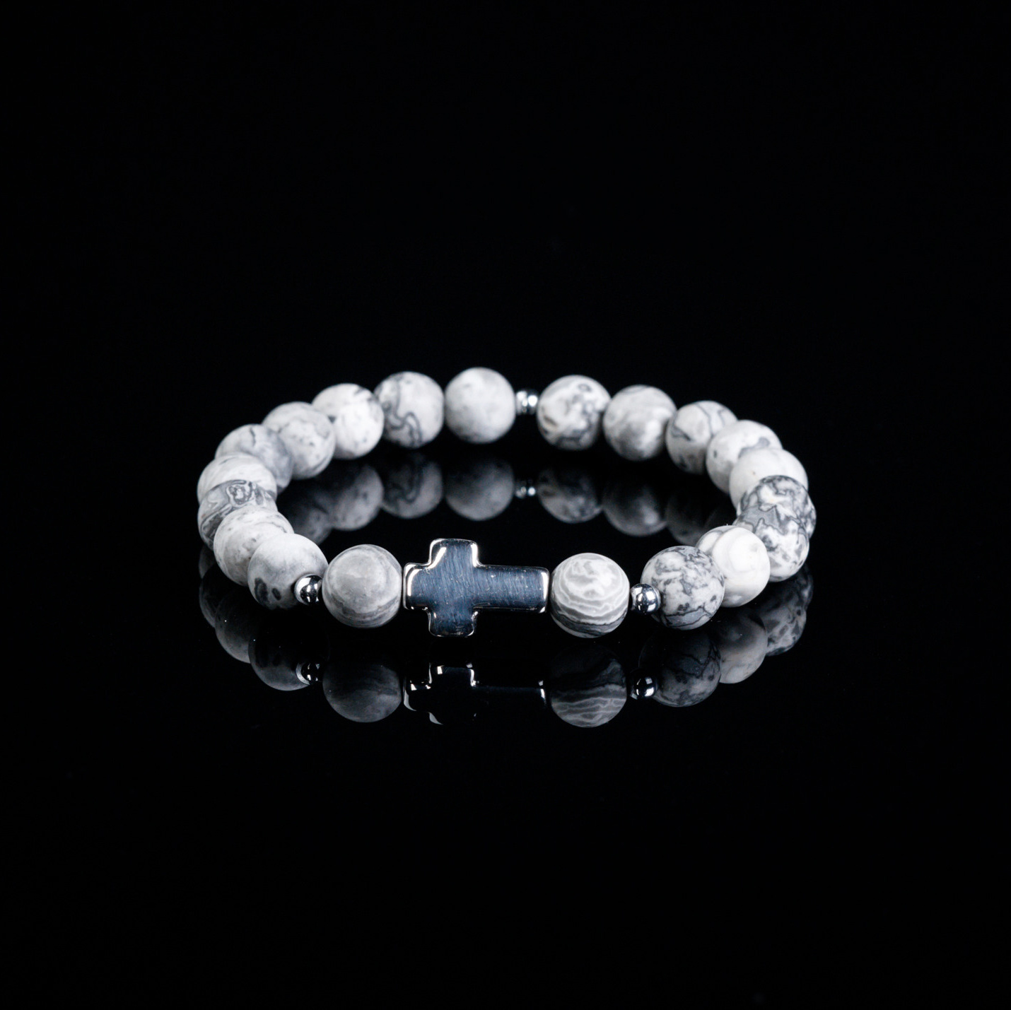 — из камней