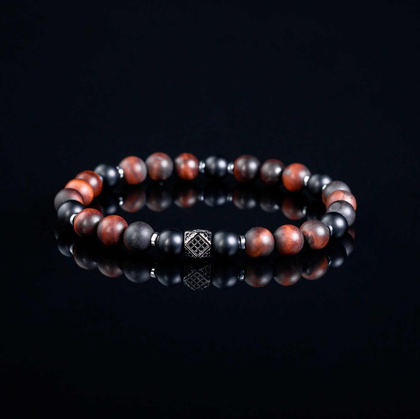 — из камней