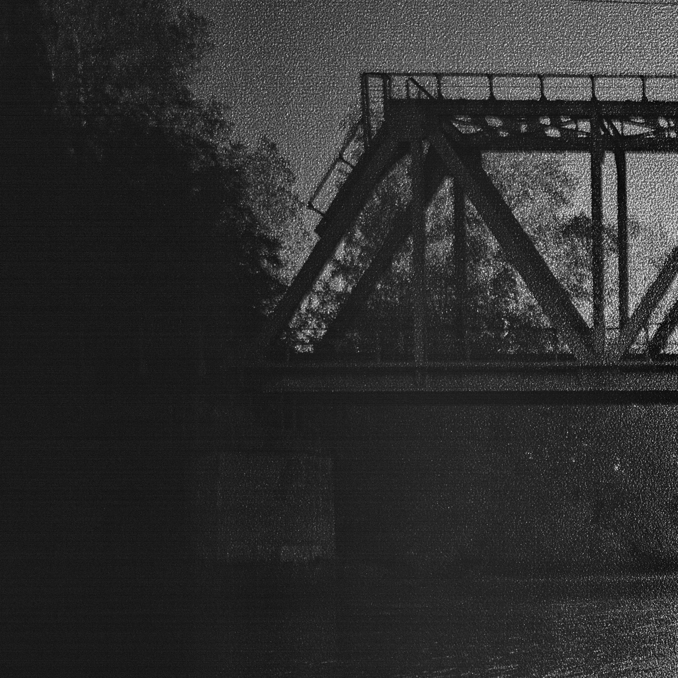 Хроно-течение Охты под заброшенным мостом. Roman Hodirev is an esoteriologist, multidisciplinary artist, photographer and musician. Saint Petersburg, Riga