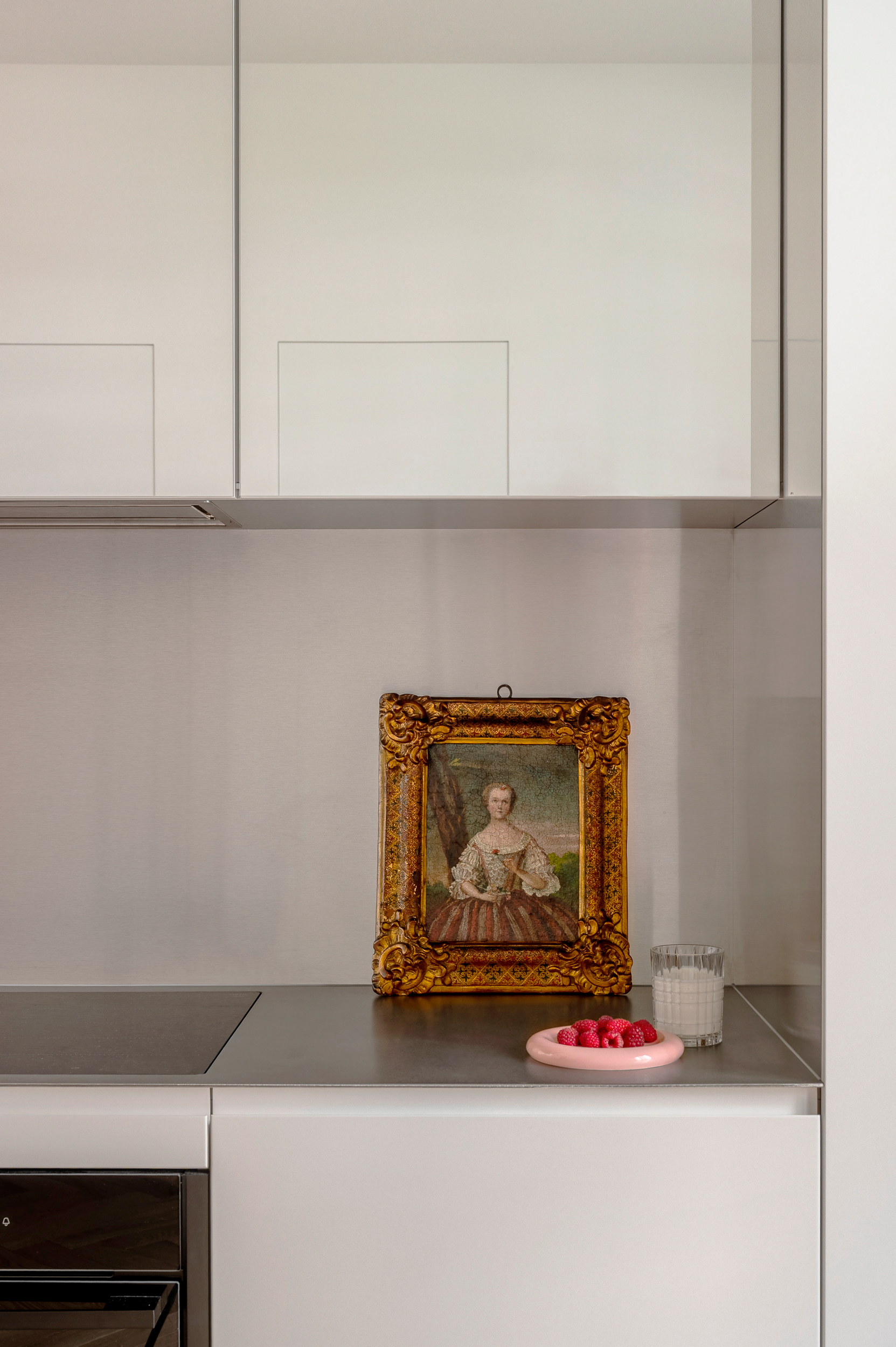 Framed artwork on the kitchen countertop