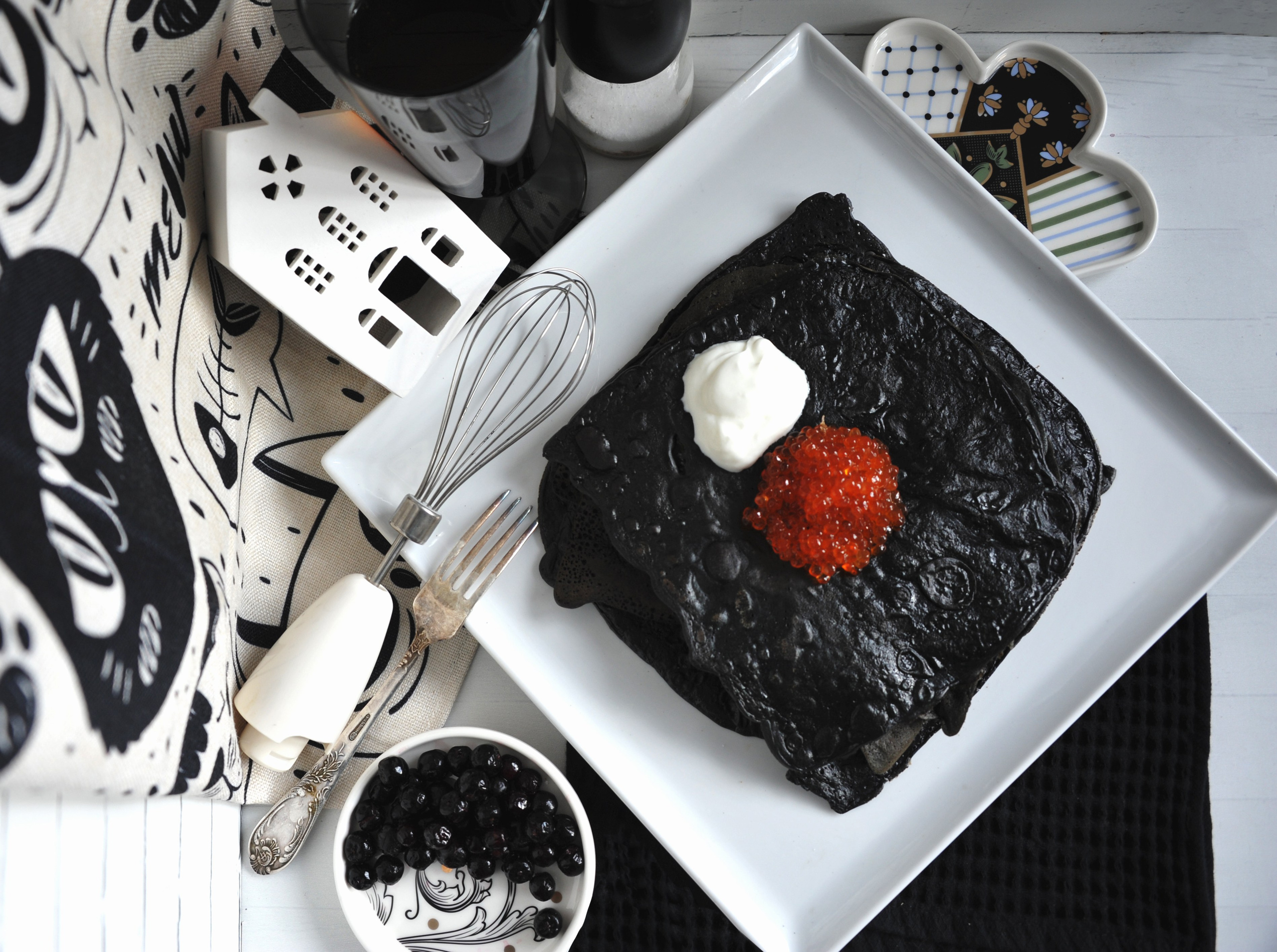 Черные квадратные блины Малевича. Ефремова Ольга. Художник