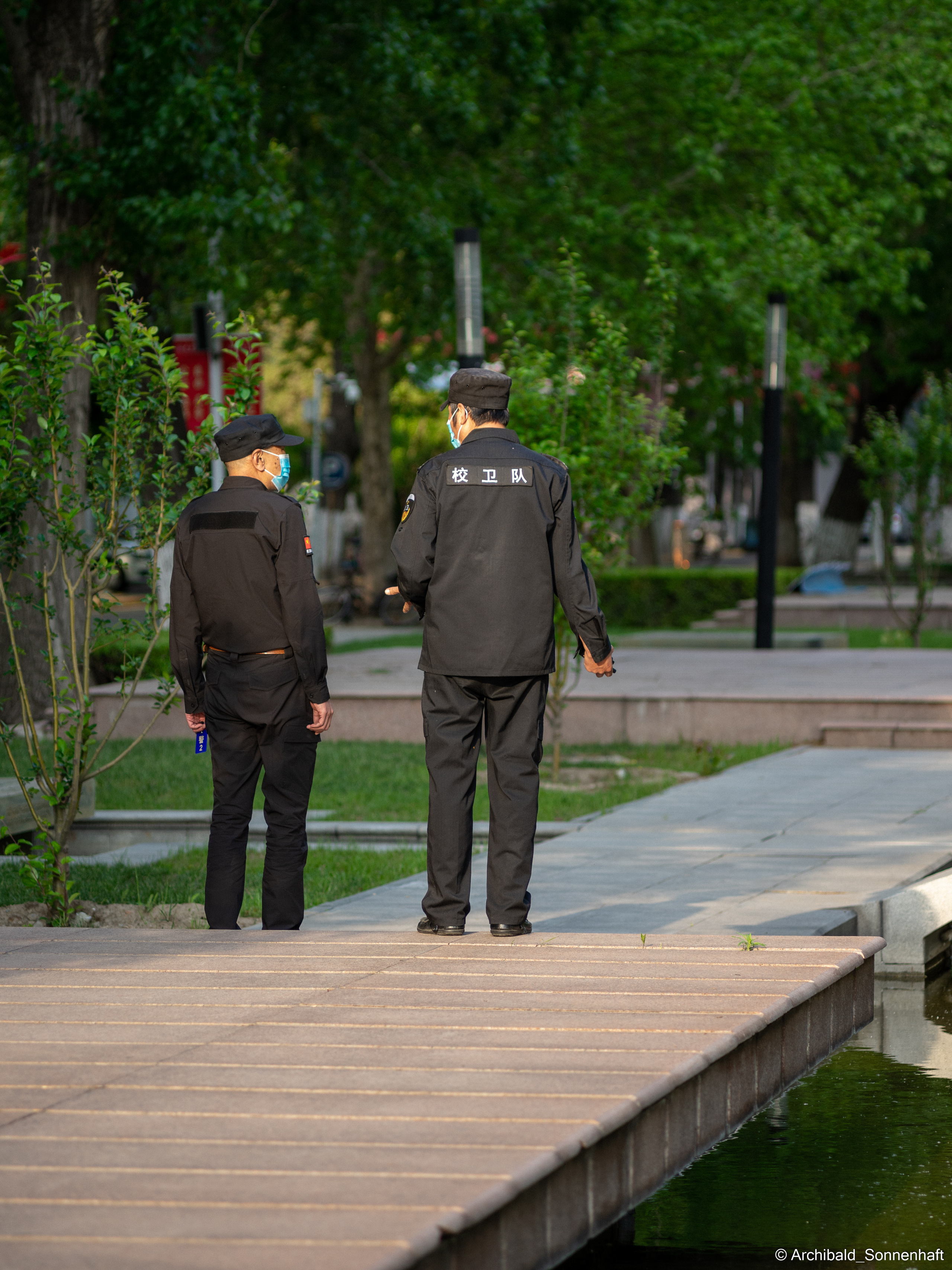 Walking in TJU on the first of May. Photographer in Guangzhou, China. Archibald Sonnenhaft
