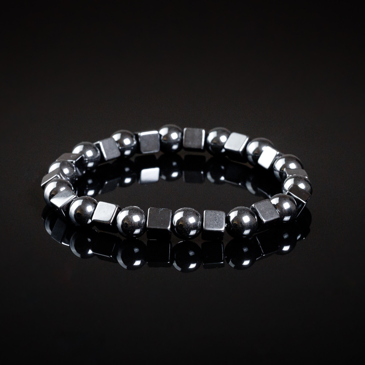 — из камней