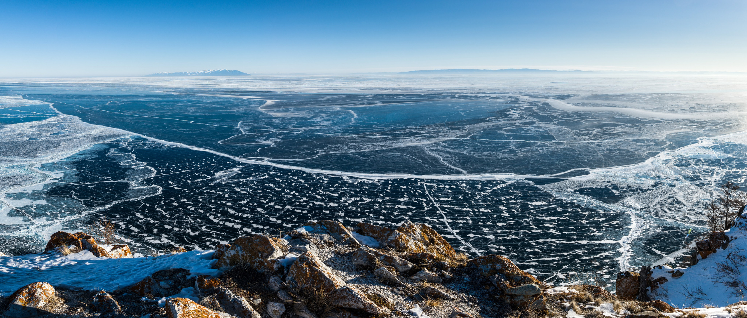 The first ice on Lake Baikal, seen from Olkhon Island. The area shown is the deepest part of the lake at more than 1600 meters. The shore in the background is more than 50 km from Olkhon.