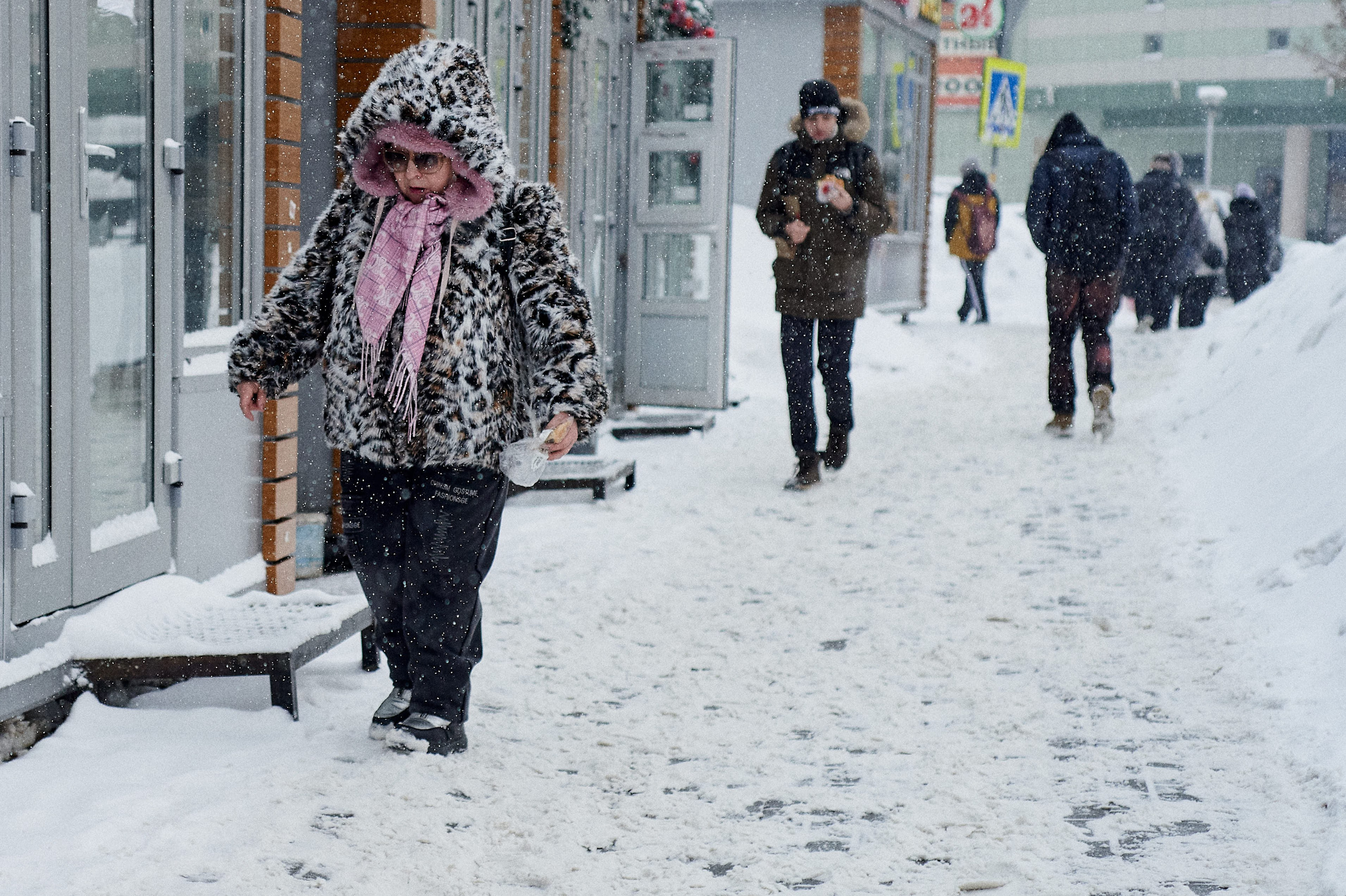 Snowdrifts in Russia. Large piles of snow accumulated along urban streets after heavy snowfall.