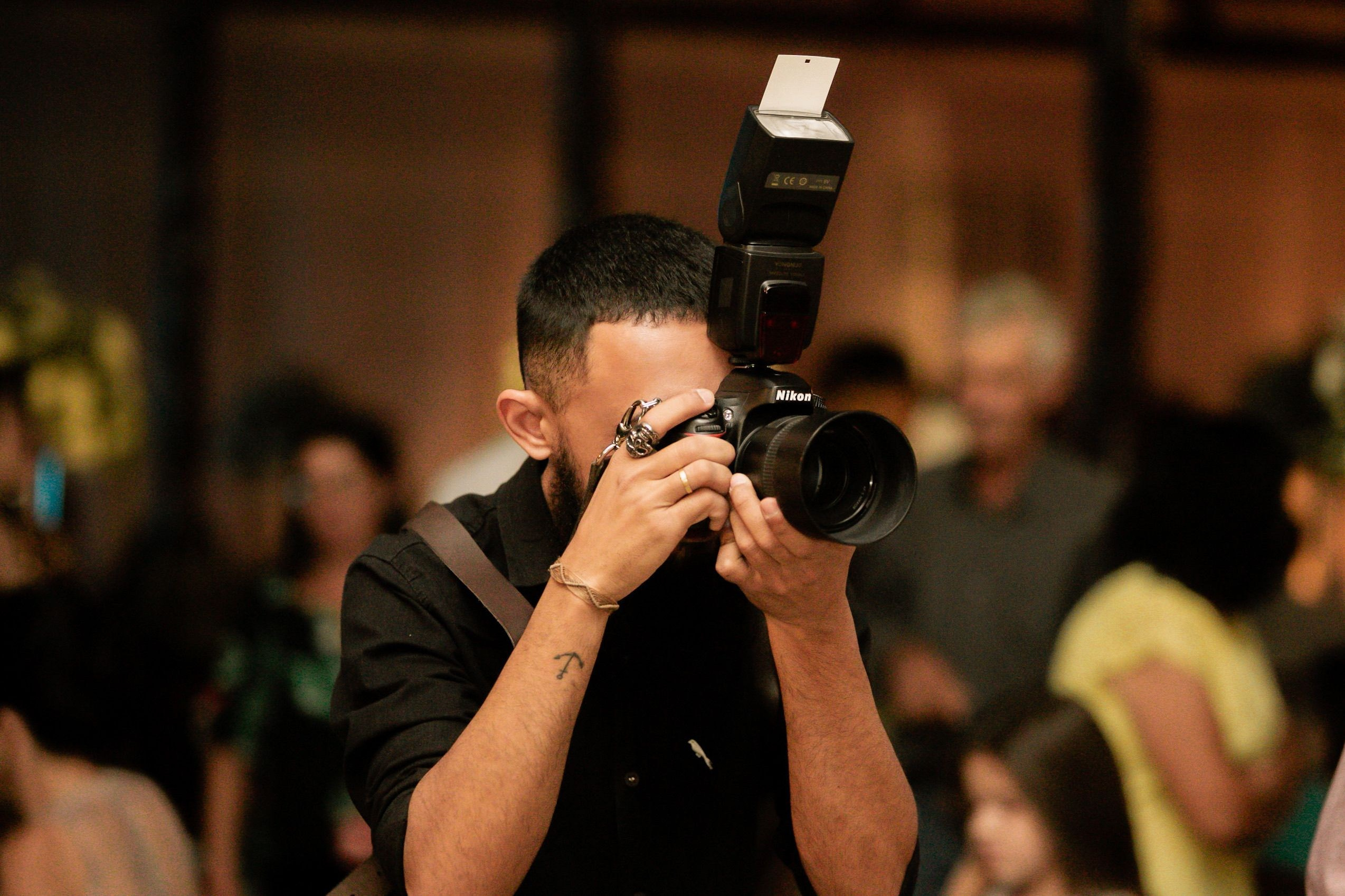 Personal photographer capturing a private event